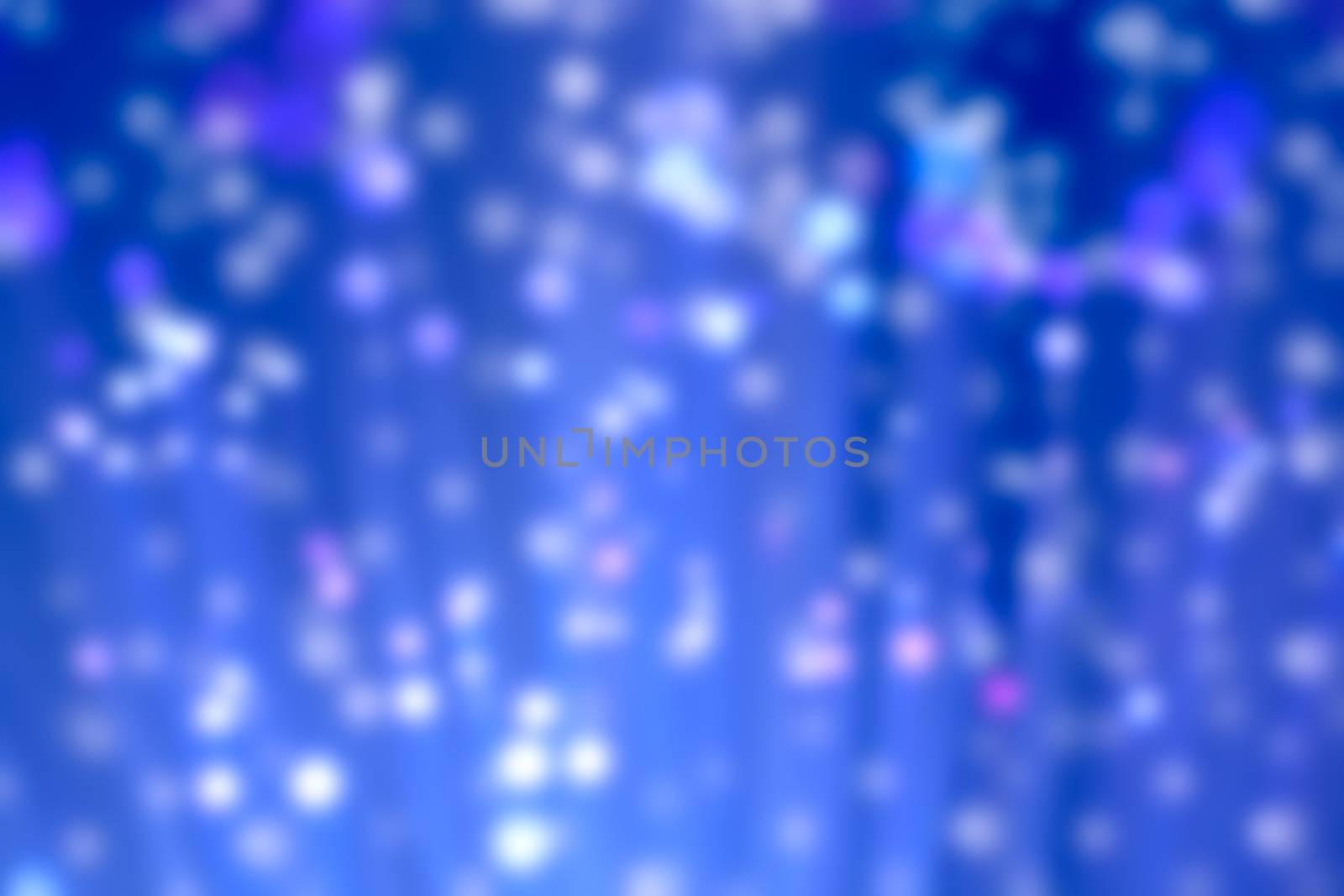 Abstract blur illuminated blue fiber optic light strands, bokeh background
