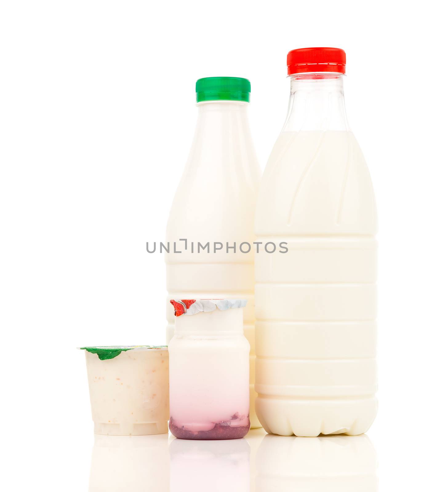 milk, dairy products and yogurt in the plastic bottle on white b by motorolka