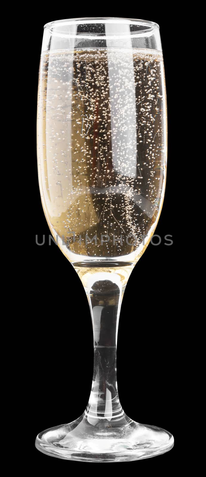 Champagne glass on black background, close up view