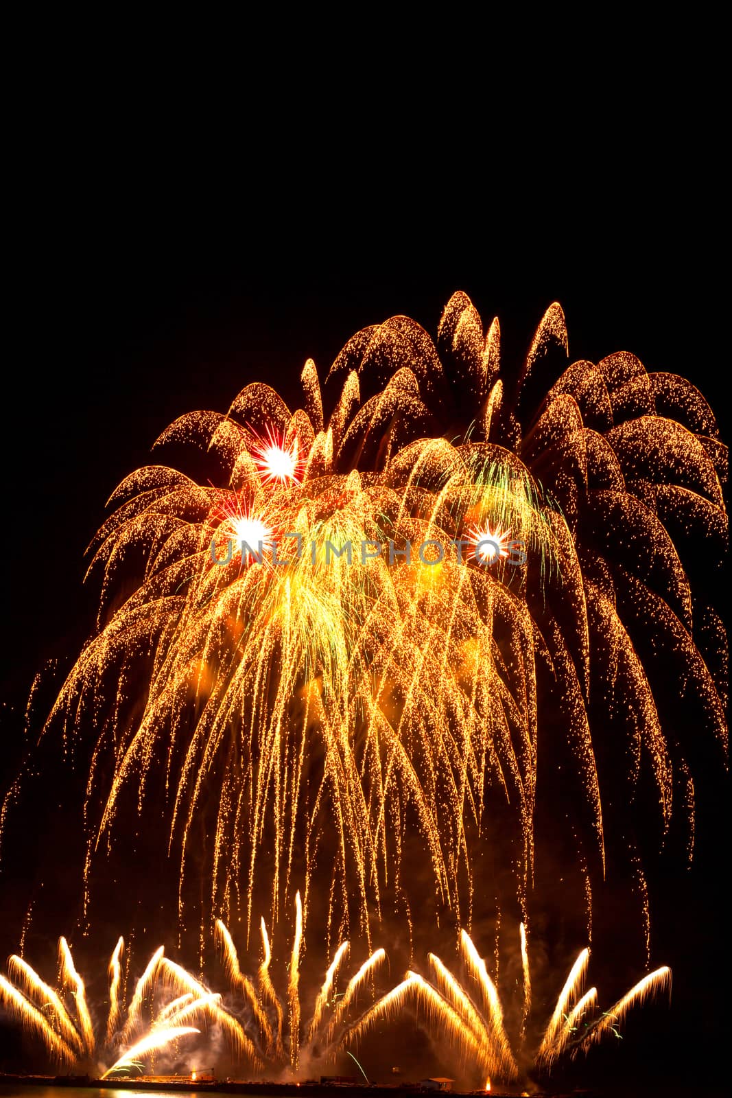 Brightly colorful fireworks in the night sky