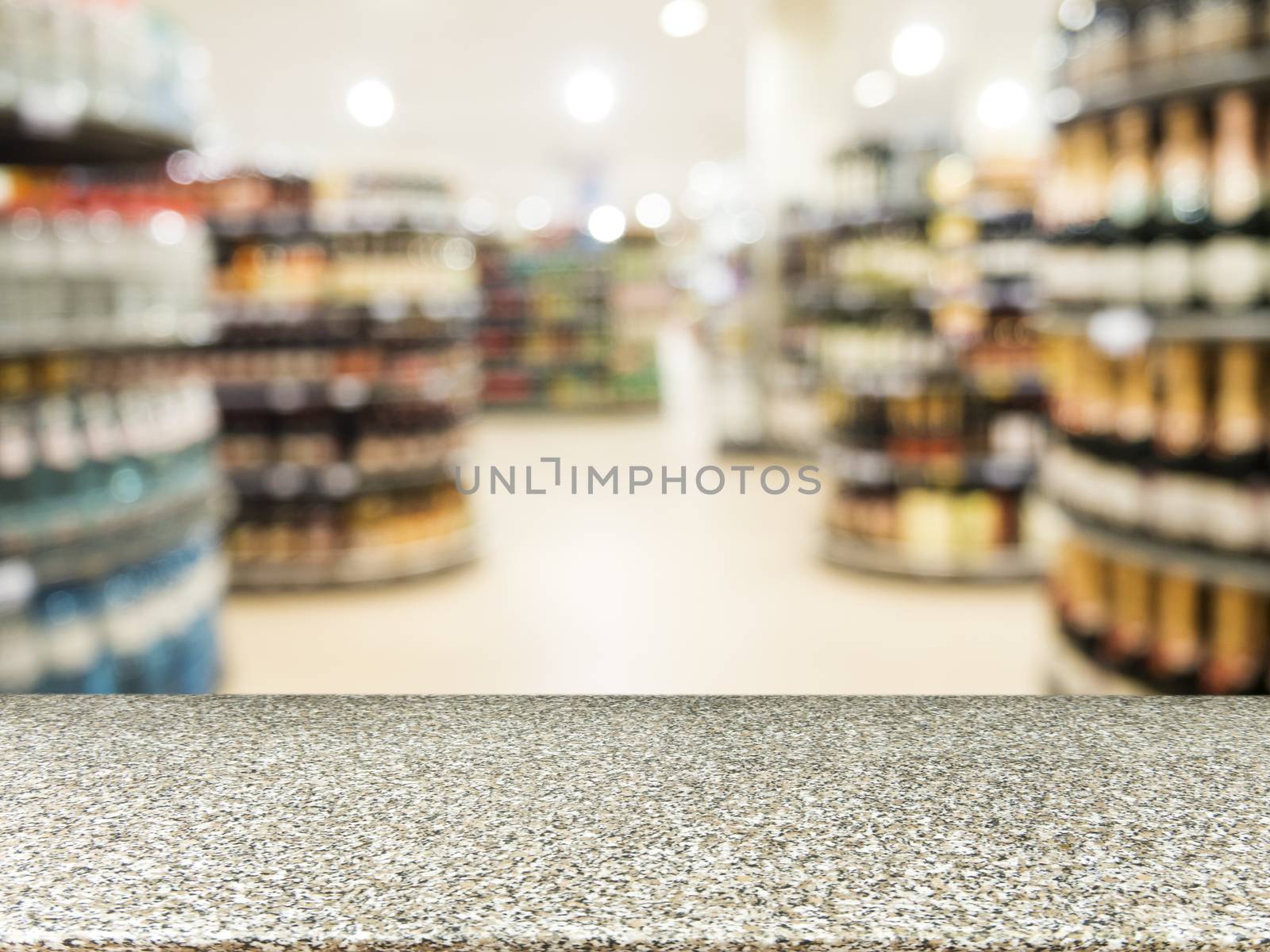 Marble empty table in front of blurred supermarket by fascinadora