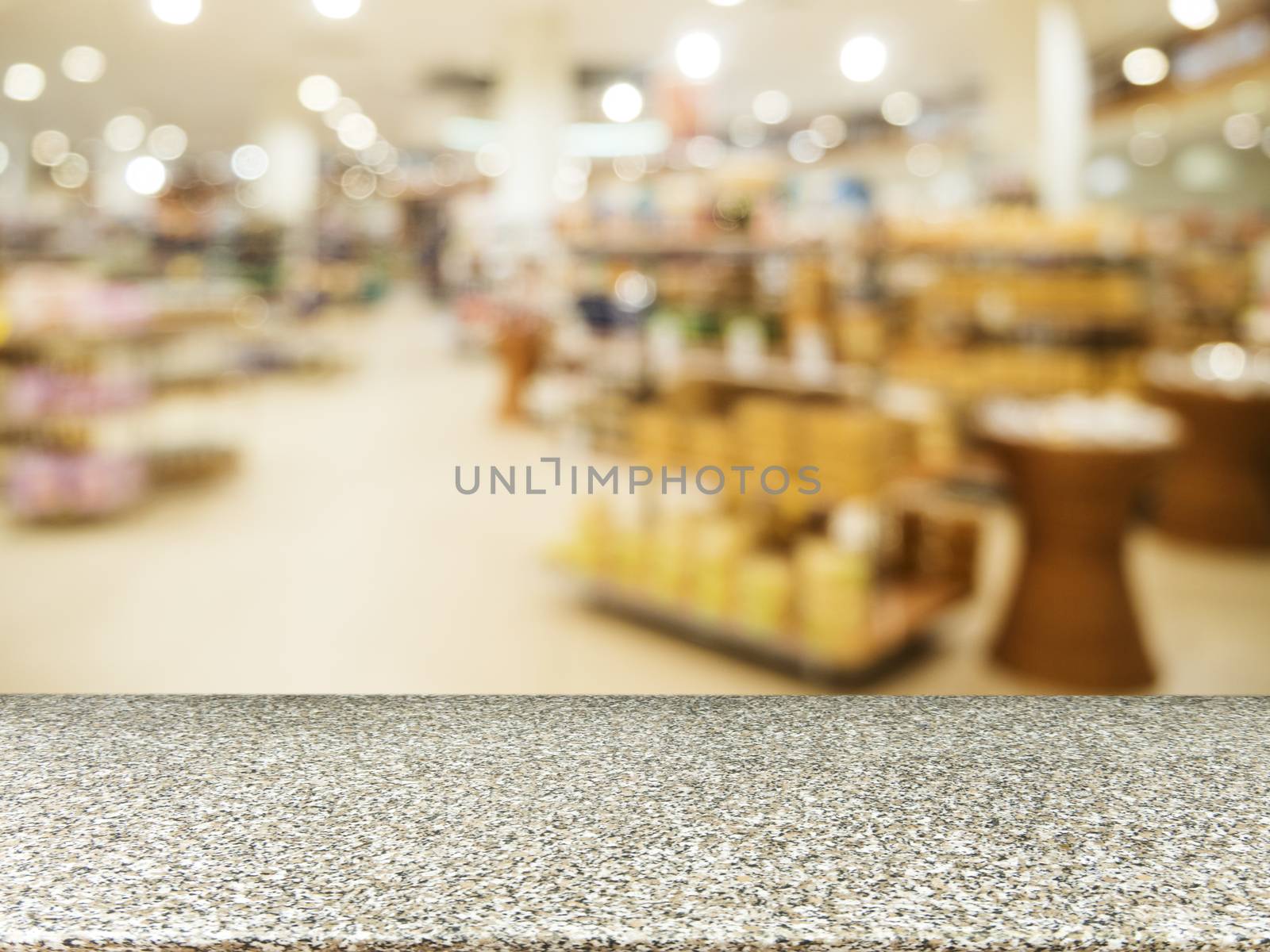 Marble empty table in front of blurred supermarket by fascinadora
