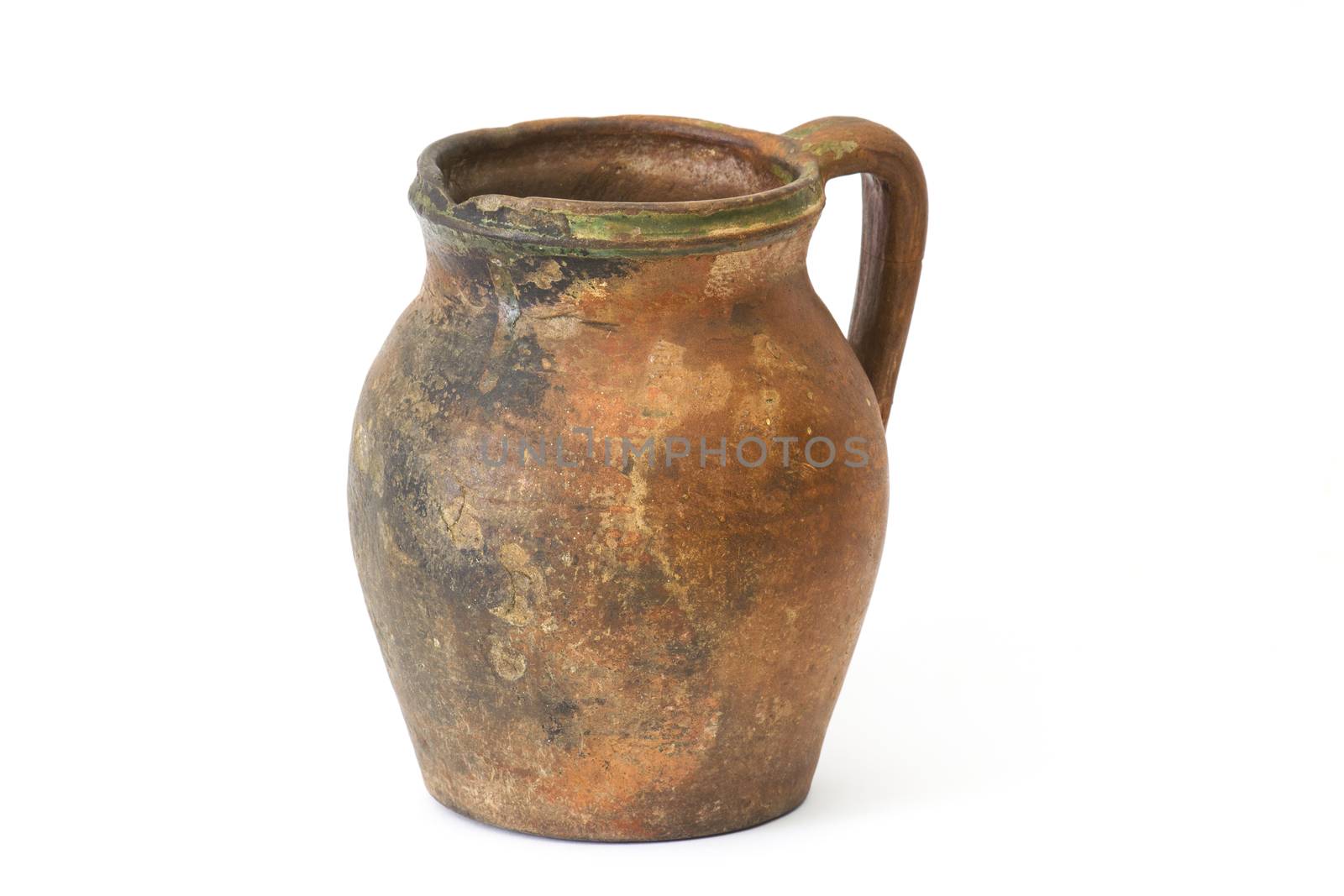 Clay jug, old ceramic vase isolated on white background by miradrozdowski