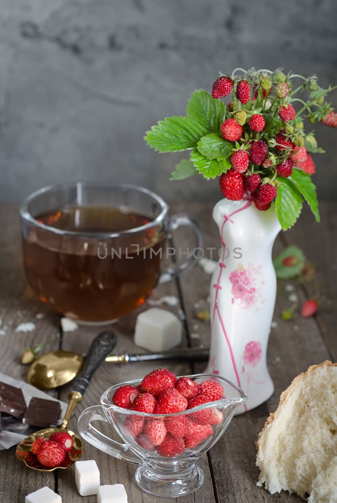 The strawberries on the table and tea by Gaina