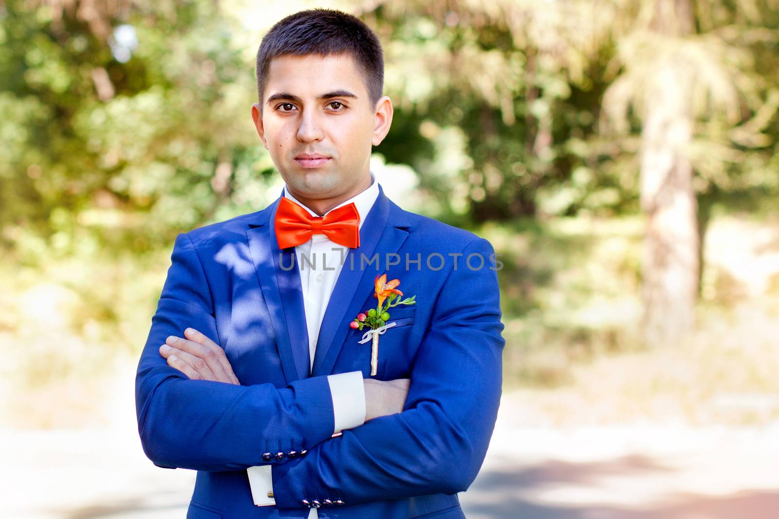 Stylish bride blue suit on a summer day