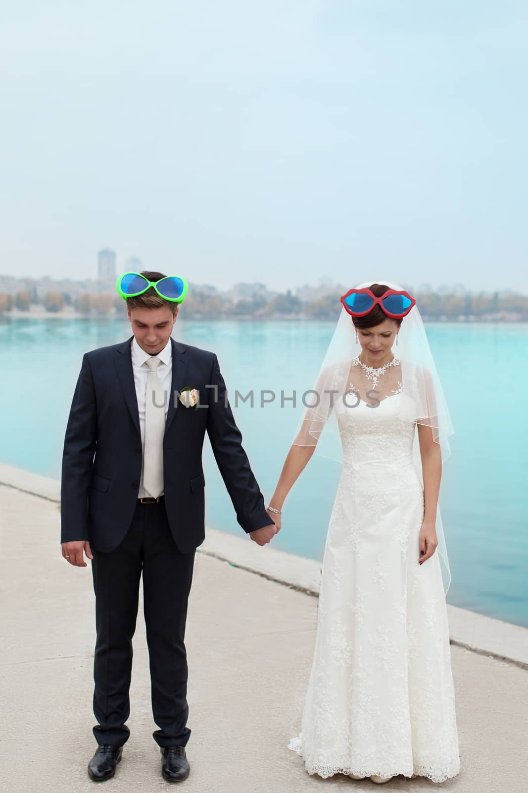 Gentle embrace bride and groom by lanser314