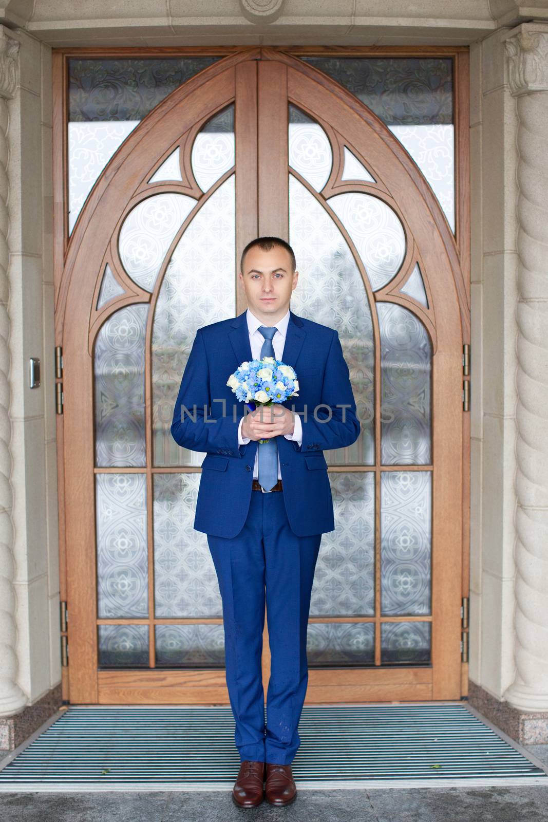 Portrait of a bridegroom close-up