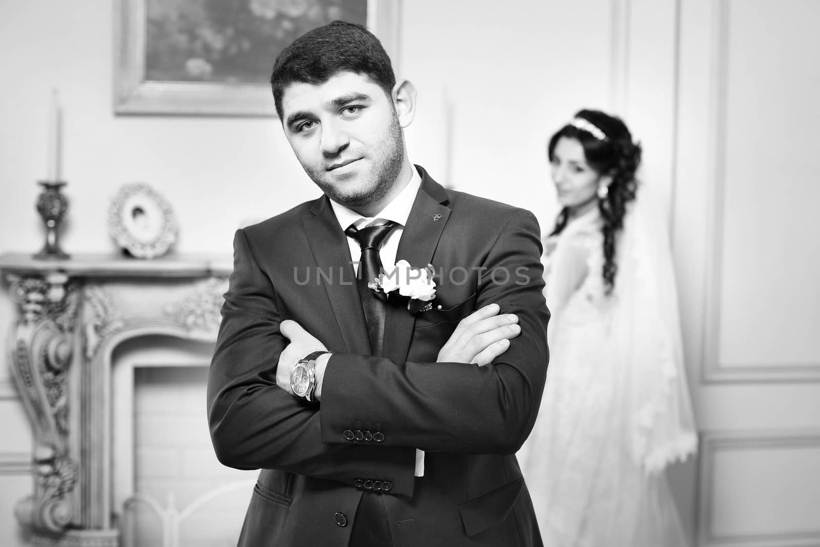 The groom gently hugged the bride on the wedding day