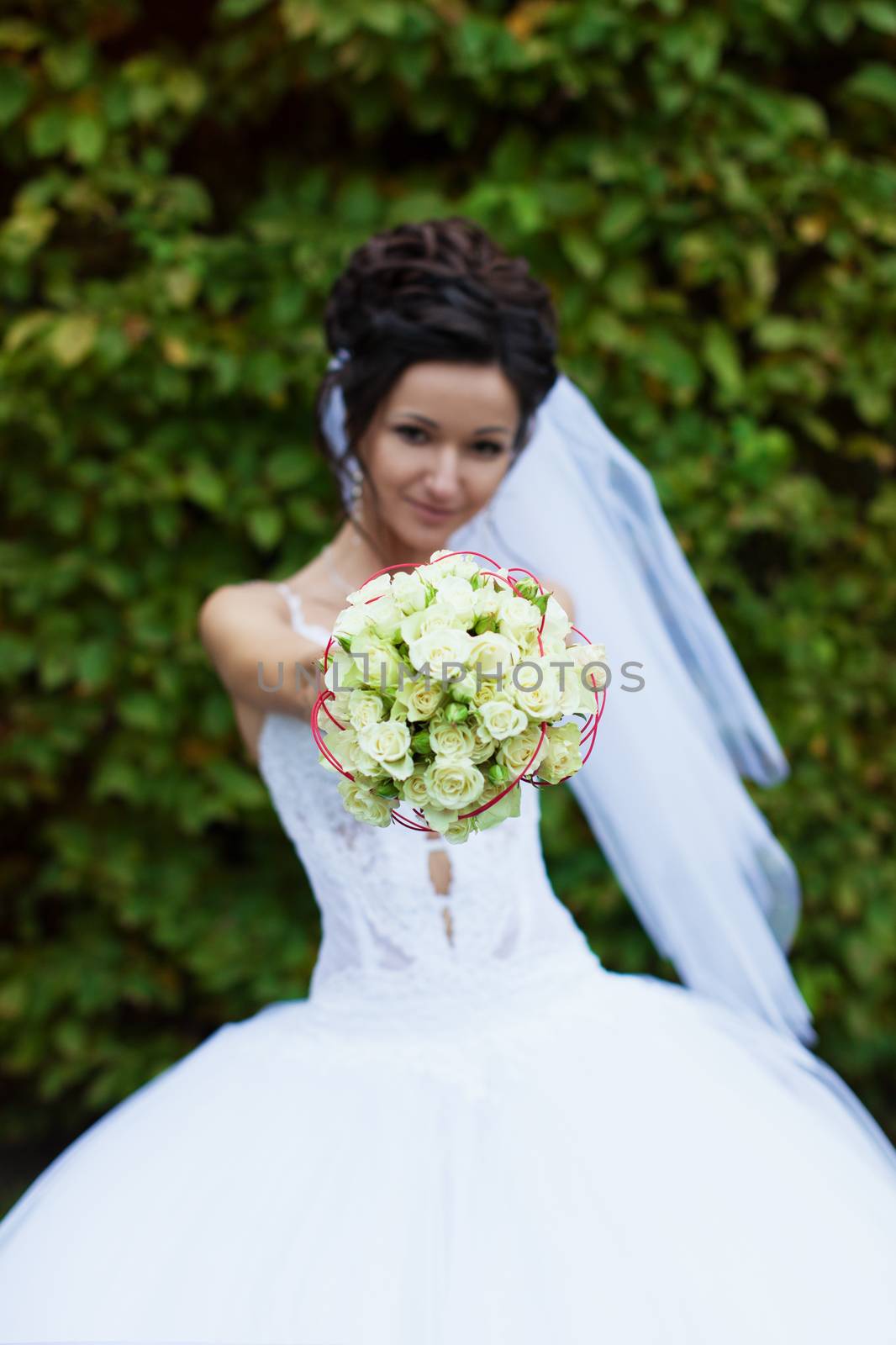 Portrait of a bride in a white dress