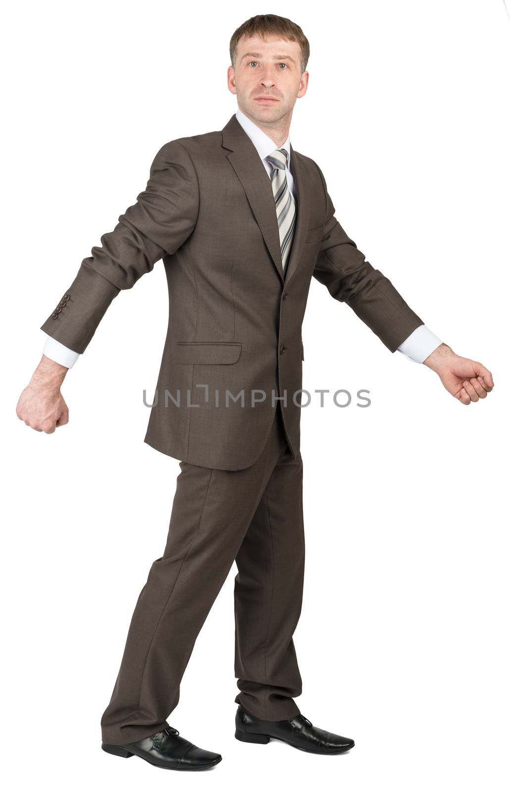 Businessman in suit ready to work isolated on white background. Looking at camera