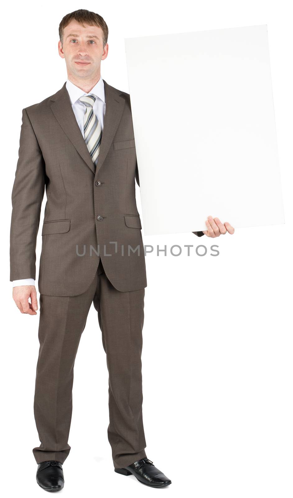 Business man holding blank banner by cherezoff