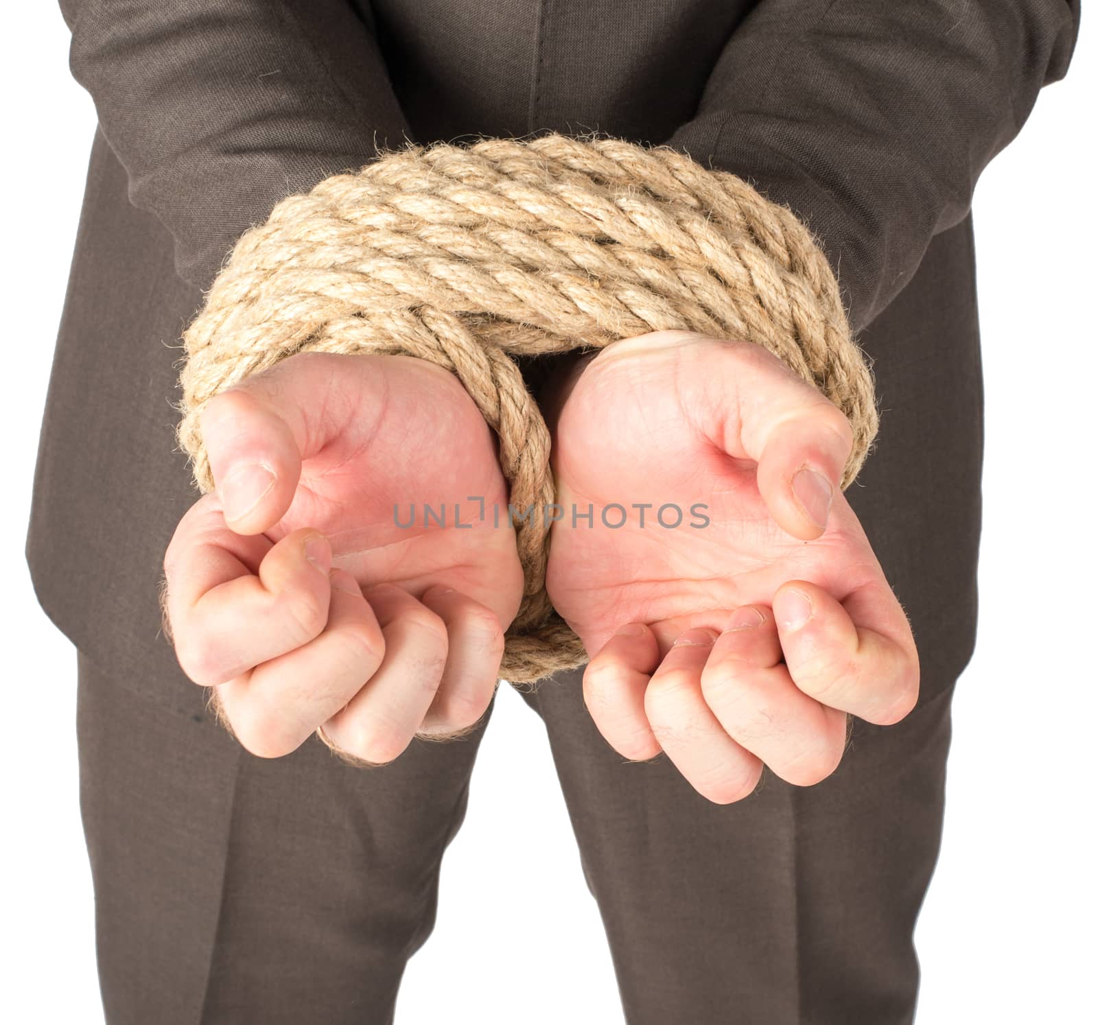 Businessman bound with rope by cherezoff