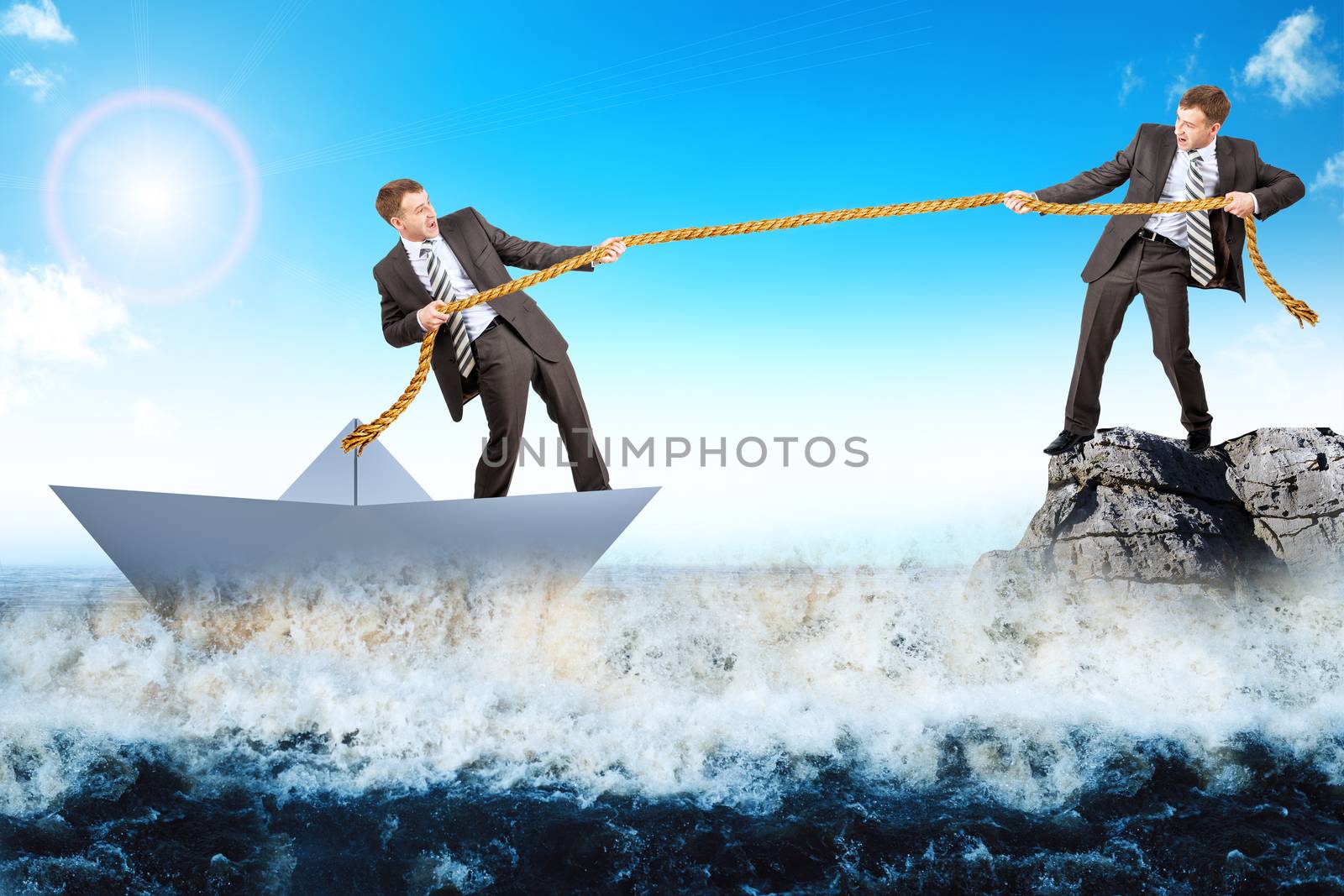Businessman on rock saving man in paperboat