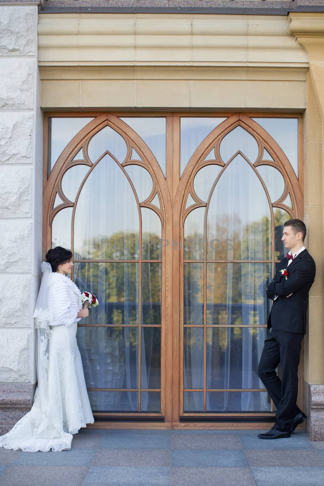 wedding copule. Beautiful bride and groom. Just merried. Close up. Happy bride and groom on their wedding hugging. 