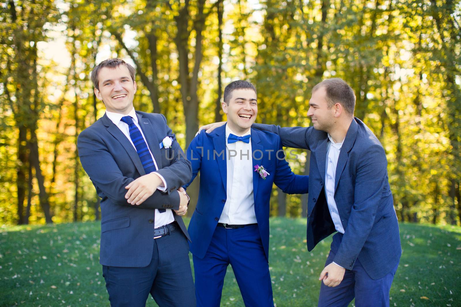 Friends laughing at the wedding of a friend by lanser314