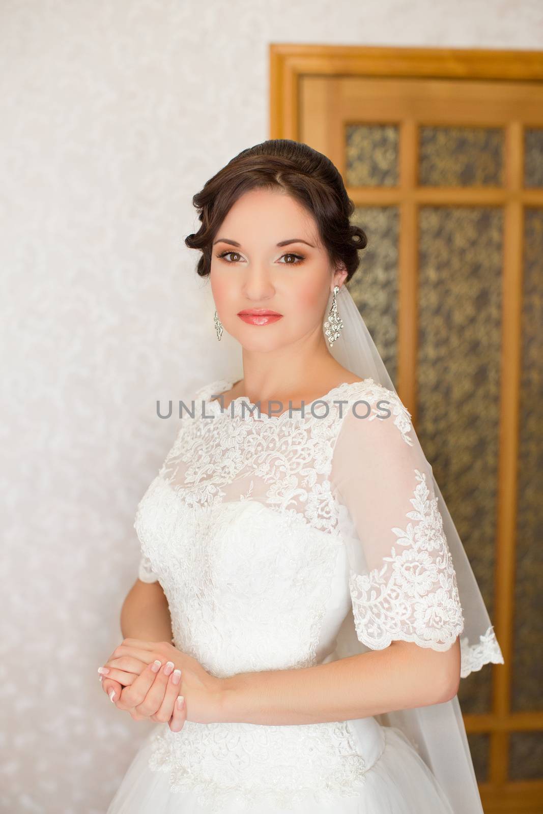 Bride with red lipstick on the lips