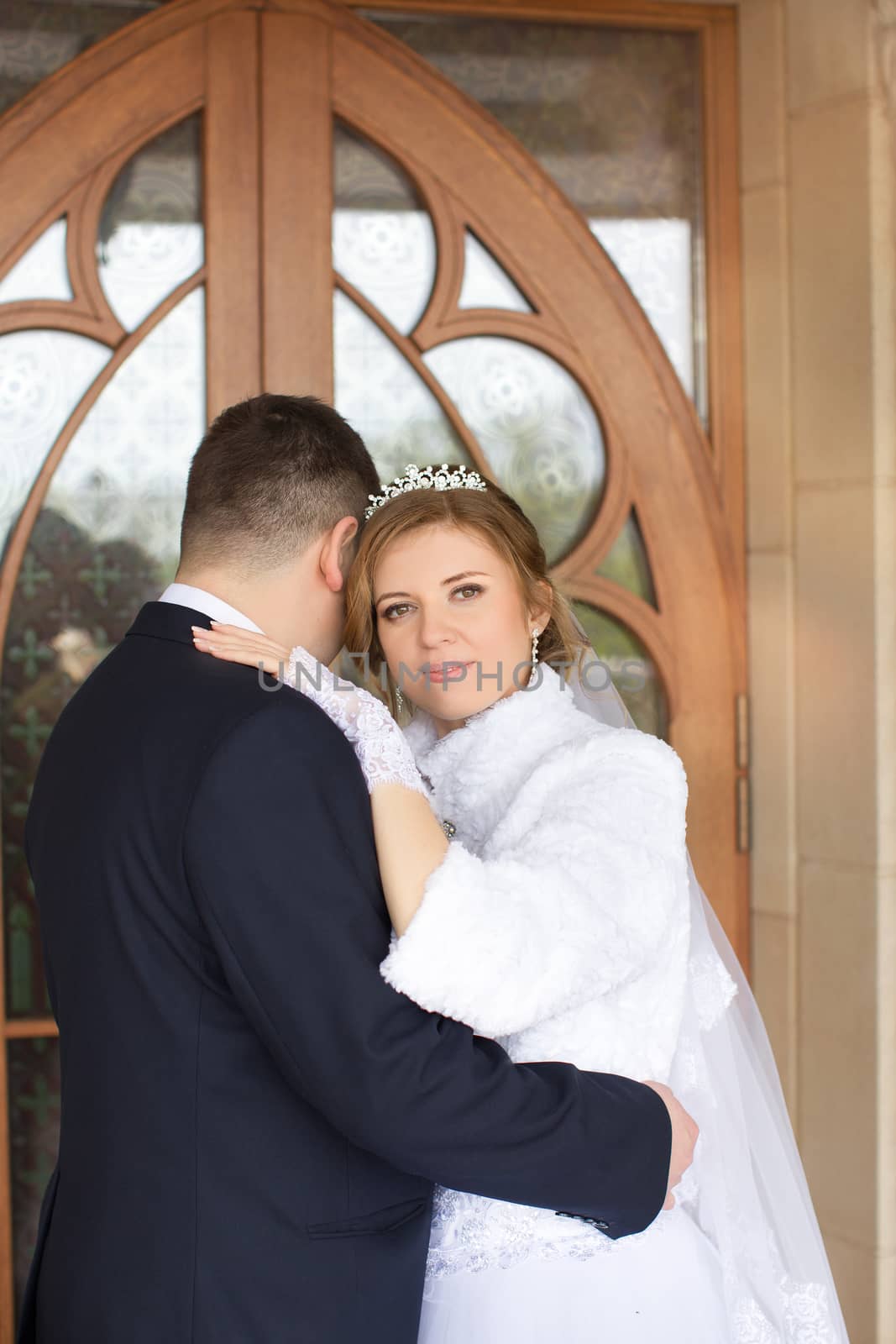 happy beautiful bride and groom walking on field. Loving wedding couple outdoor. Bride and groom.Wedding concept.