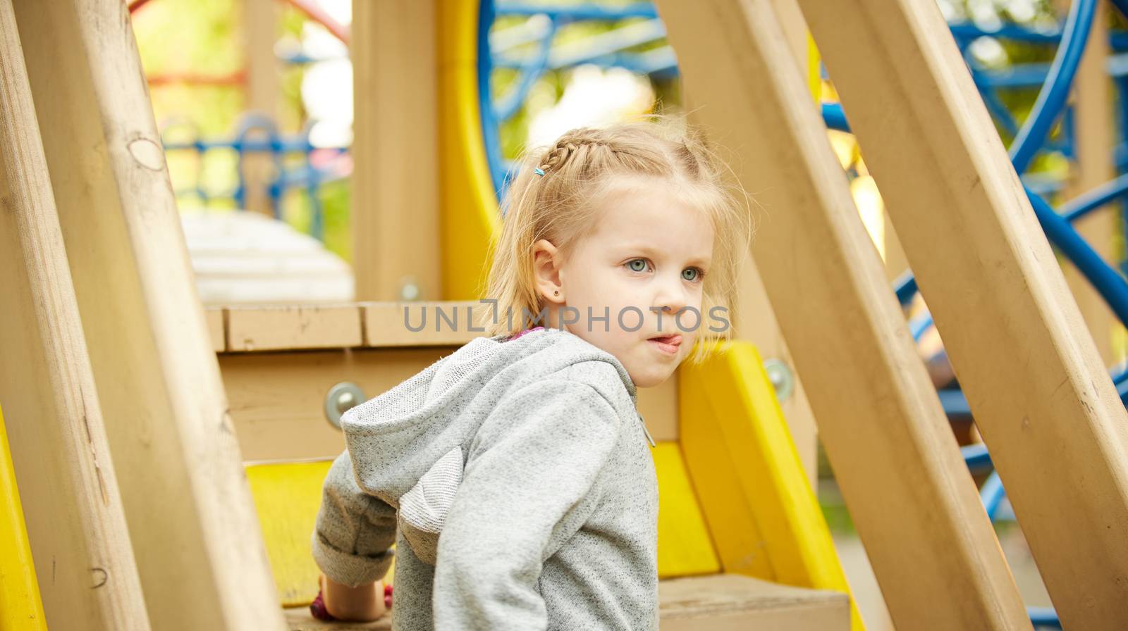 Outdoor Portrait of a Thoughtful LIttle Girl