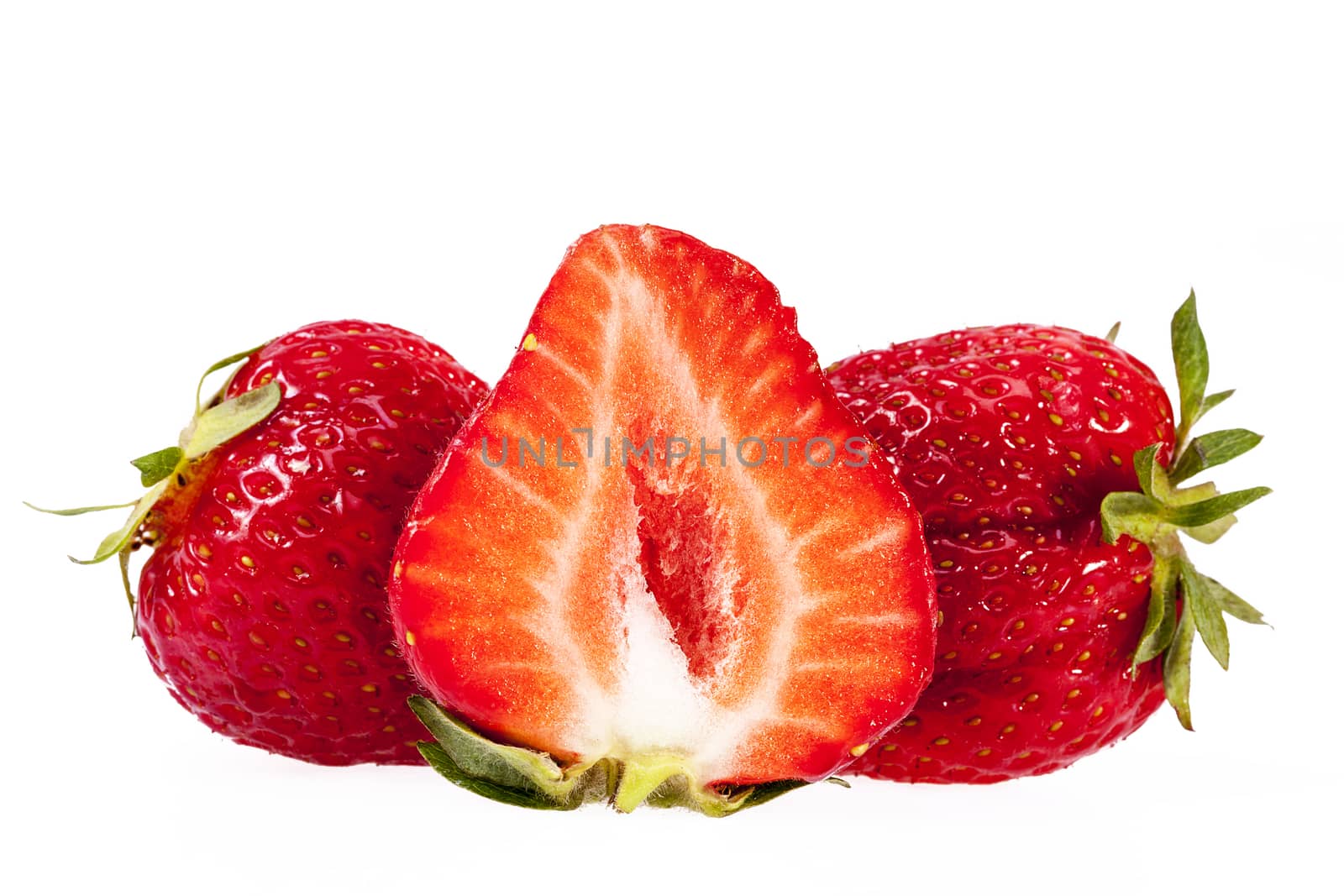 fruits of red cut  strawberries isolated on white background.