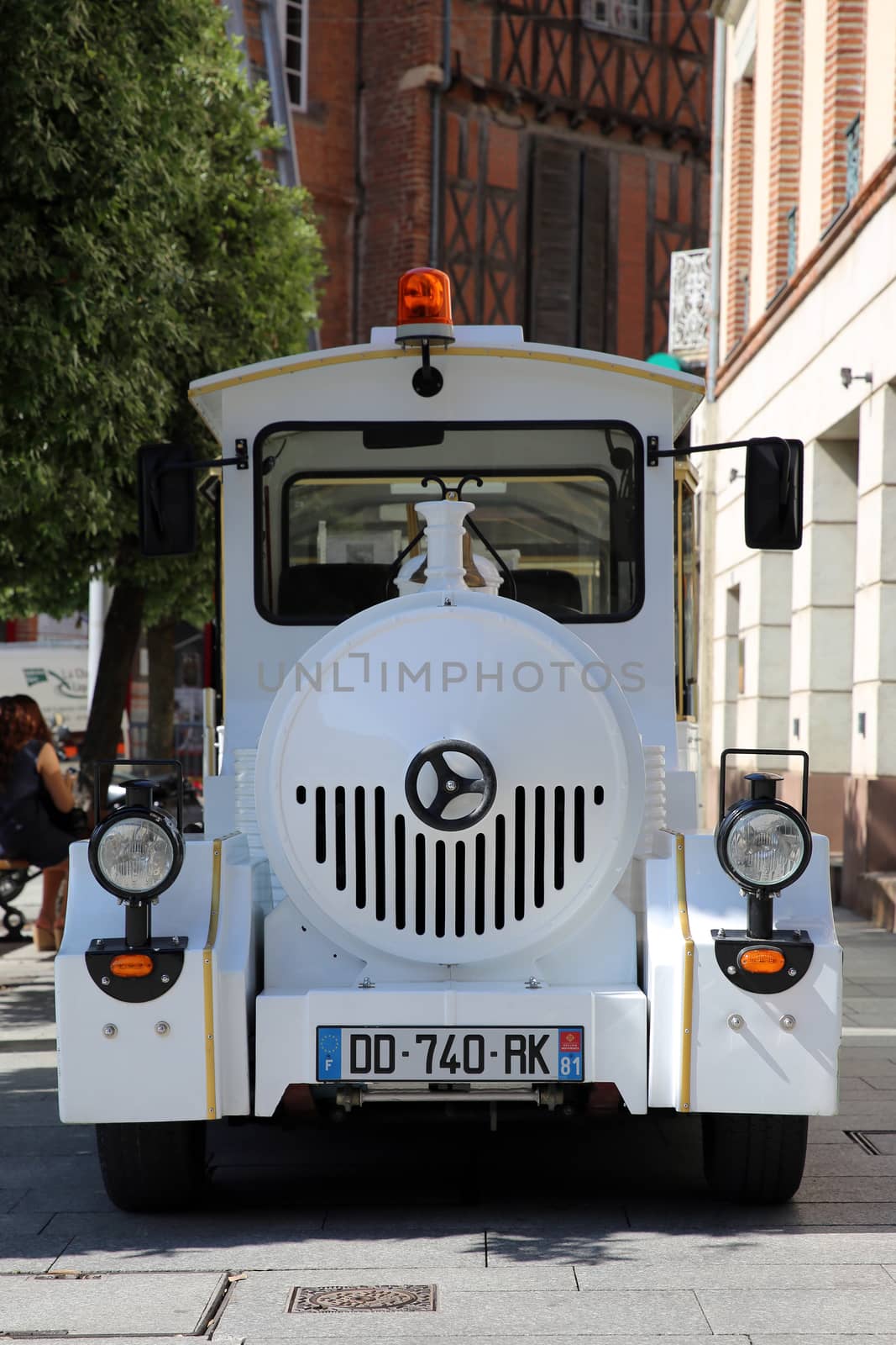Albi, France - June 9, 2016:  White Trackless Train for Sightseeing in the Streets of Albi, Commune in Southern France