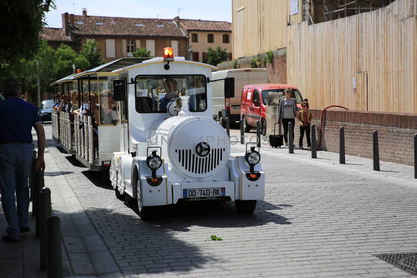 Albi, France - June 9, 2016:  White Trackless Train for Sightseeing in the Streets of Albi, Commune in Southern France