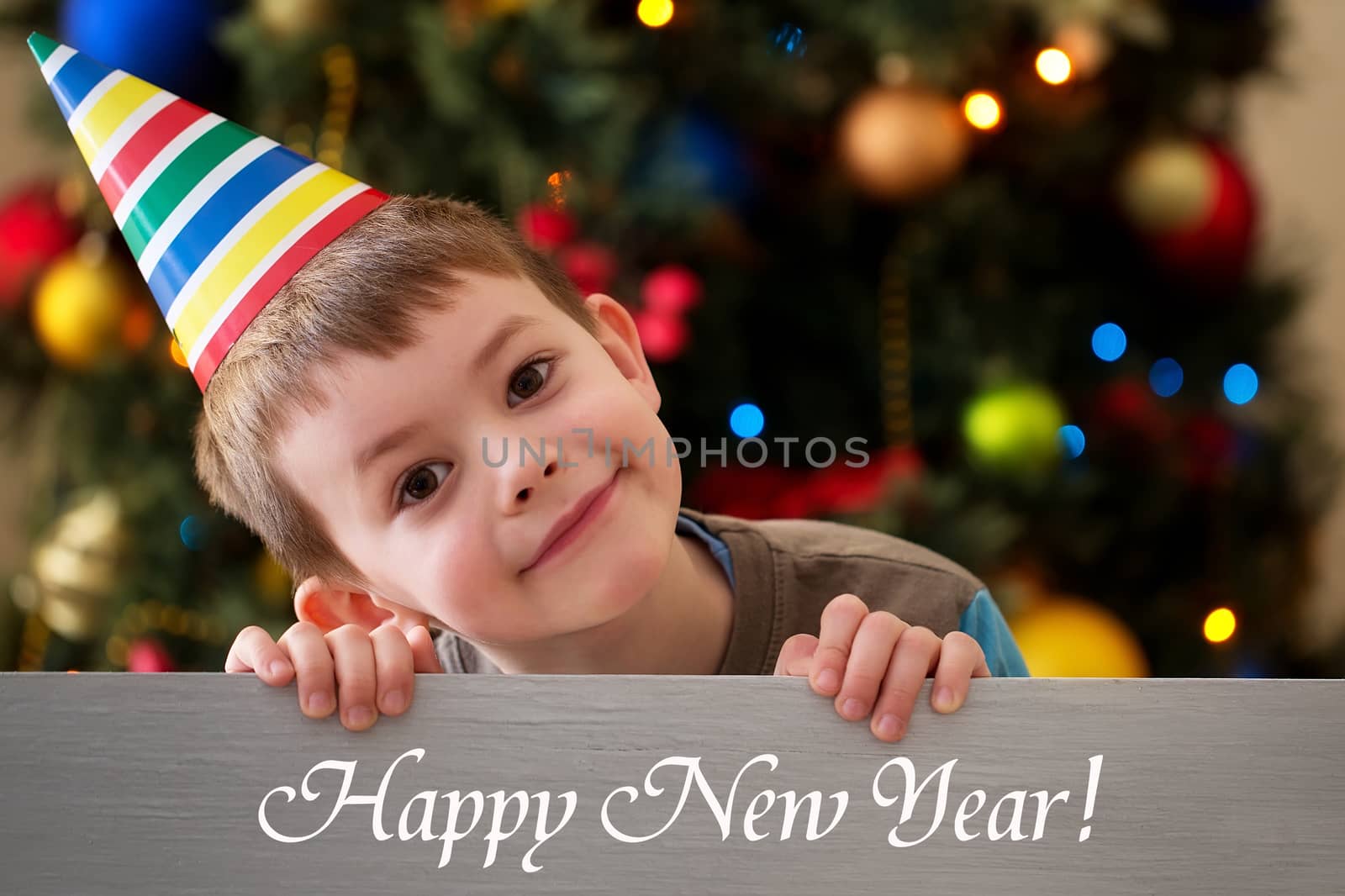 Happy New Year 2016 - boy on a Christmas tree background by johan10