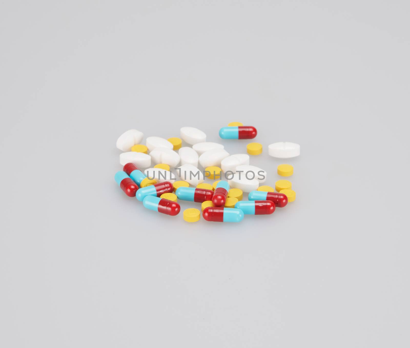 Close up of capsule and pill of drug by ninun