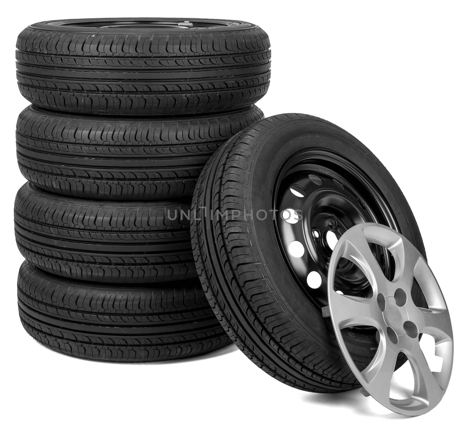 Closeup of five tires with wheel cap, isolated over white background