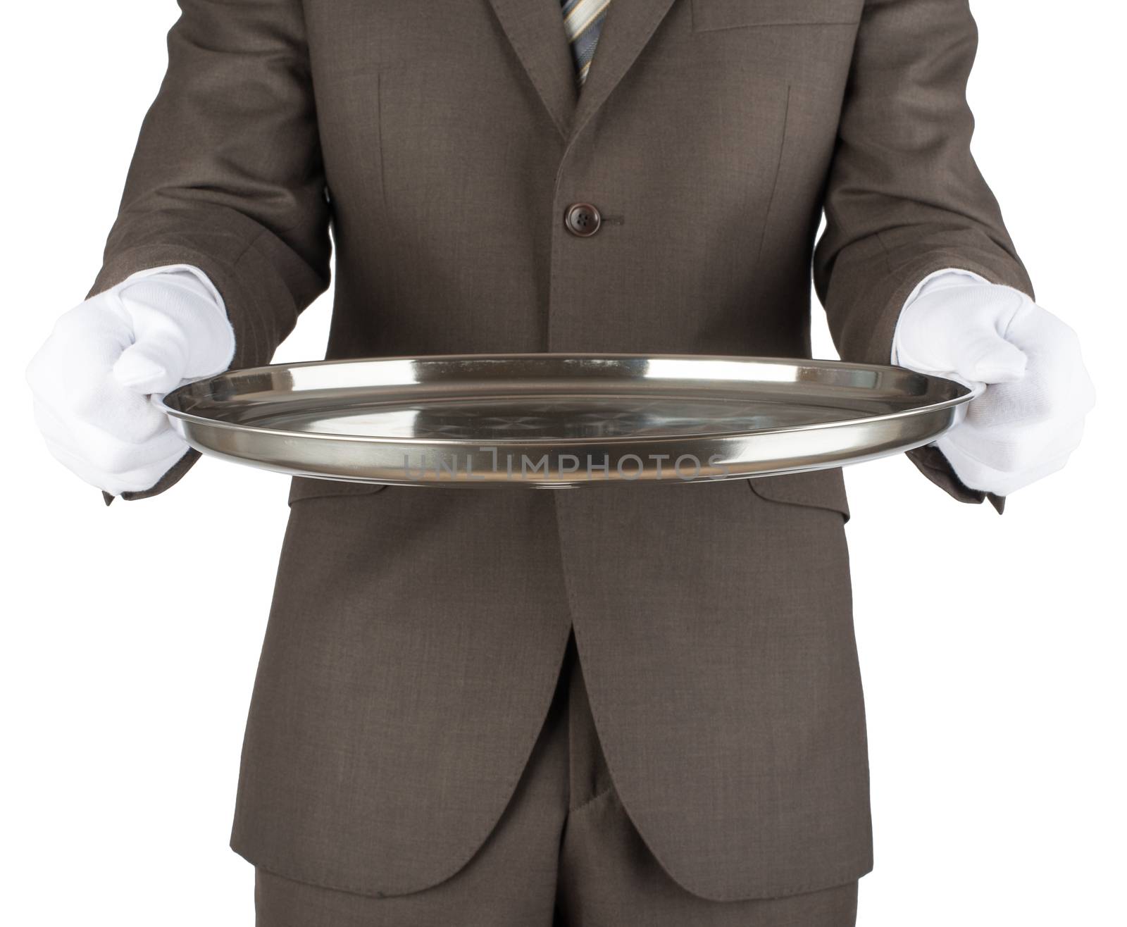 Waiter holding empty silver tray by cherezoff
