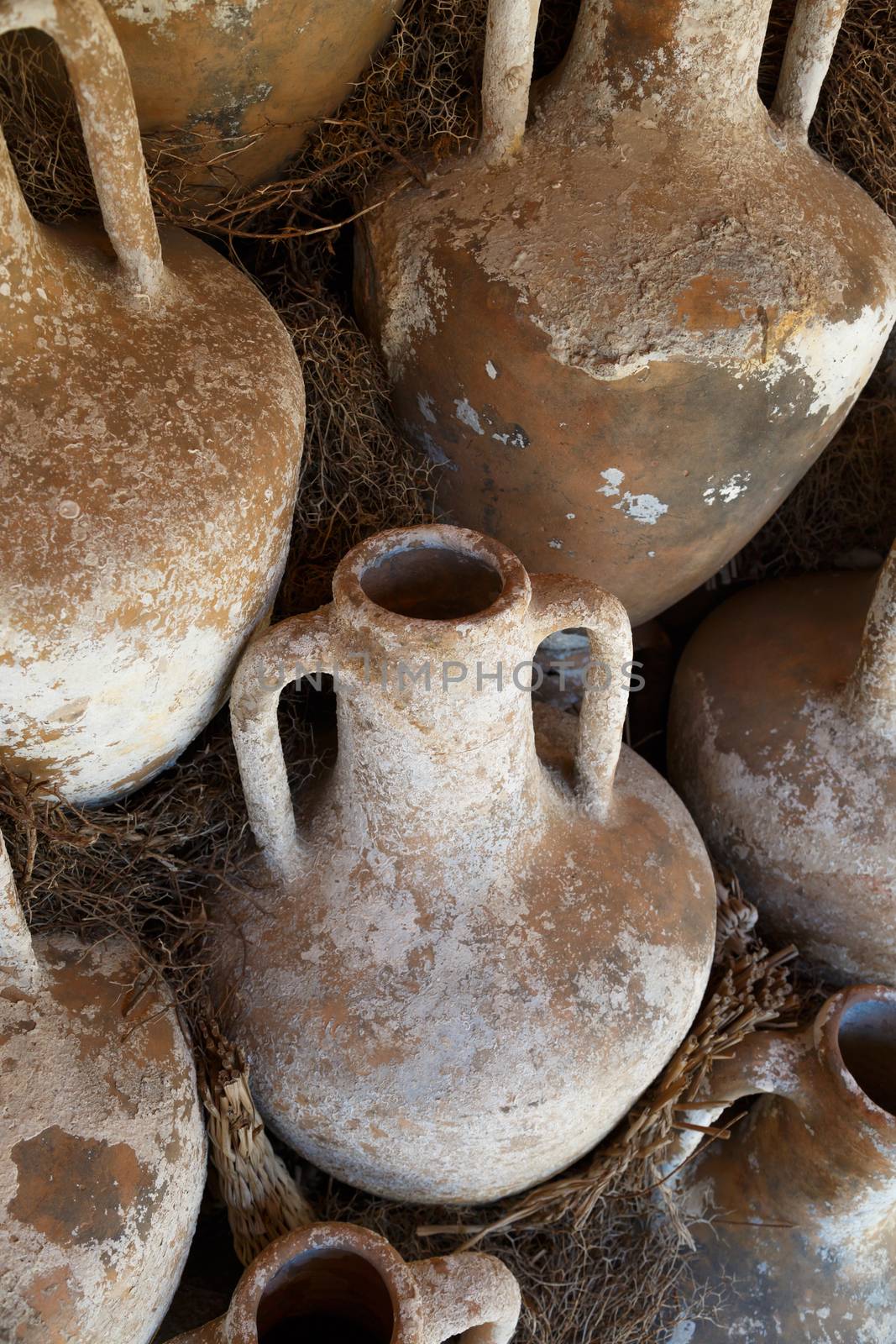 Close up detailed view of historical clay amphora used in old times.