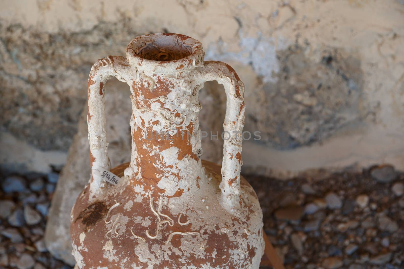 Close up detailed view of historical clay amphora used in old times.
