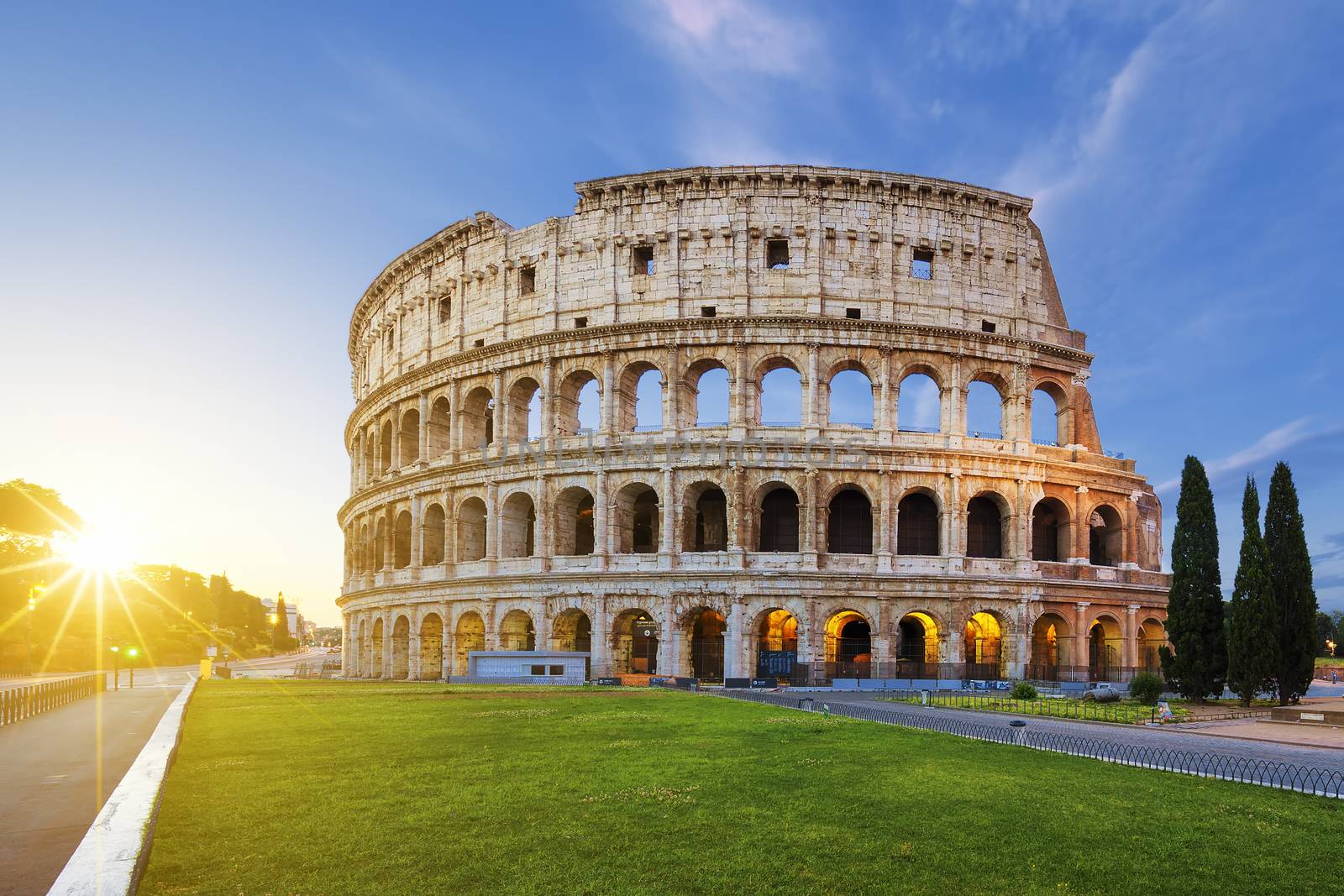 View of Colosseum in Rome at sunrise by vwalakte