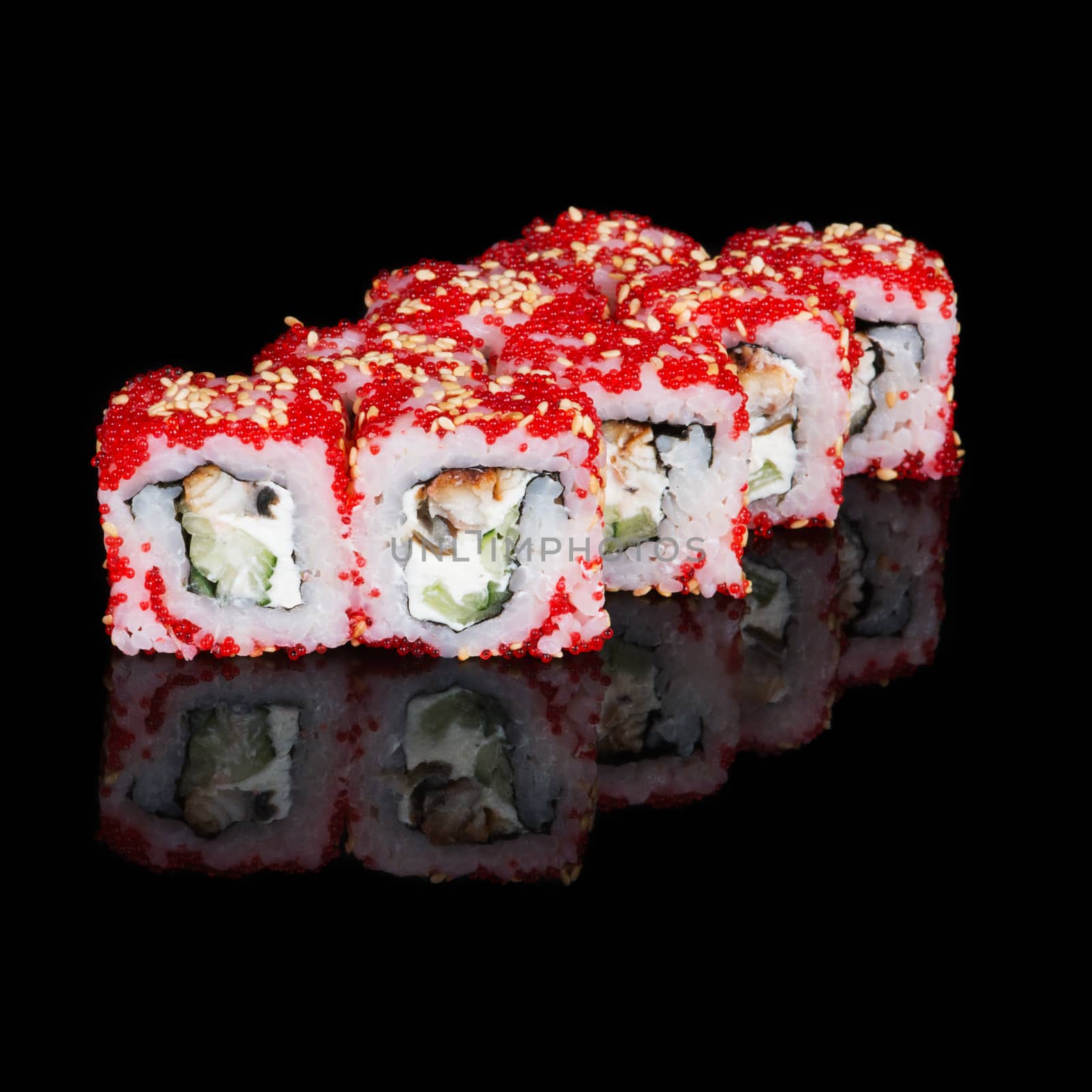 Sushi rolls with soft cheese, eel, cucumber and flying fish roe by kzen
