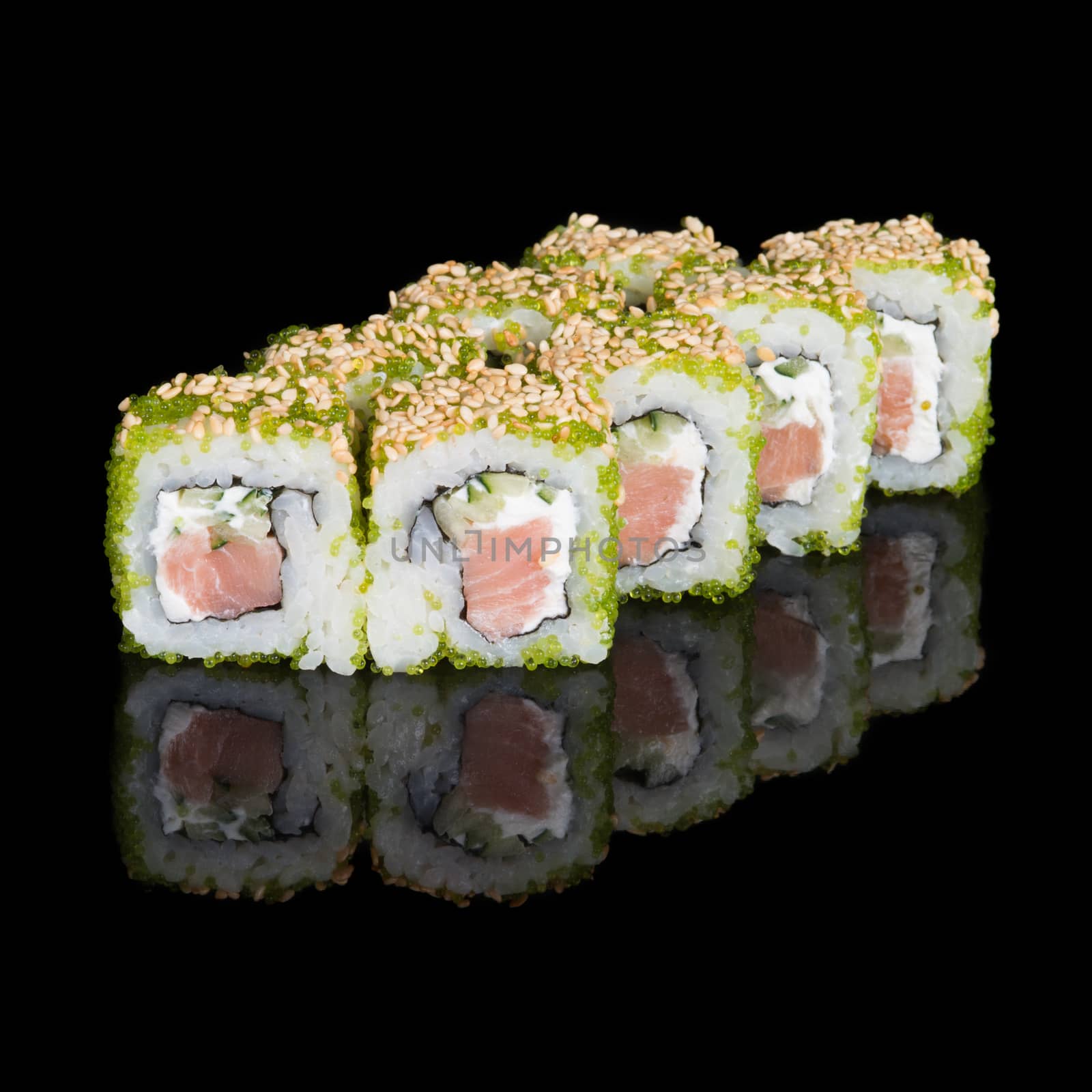 Sushi rolls with salmon, cucumber and flying fish roe by kzen