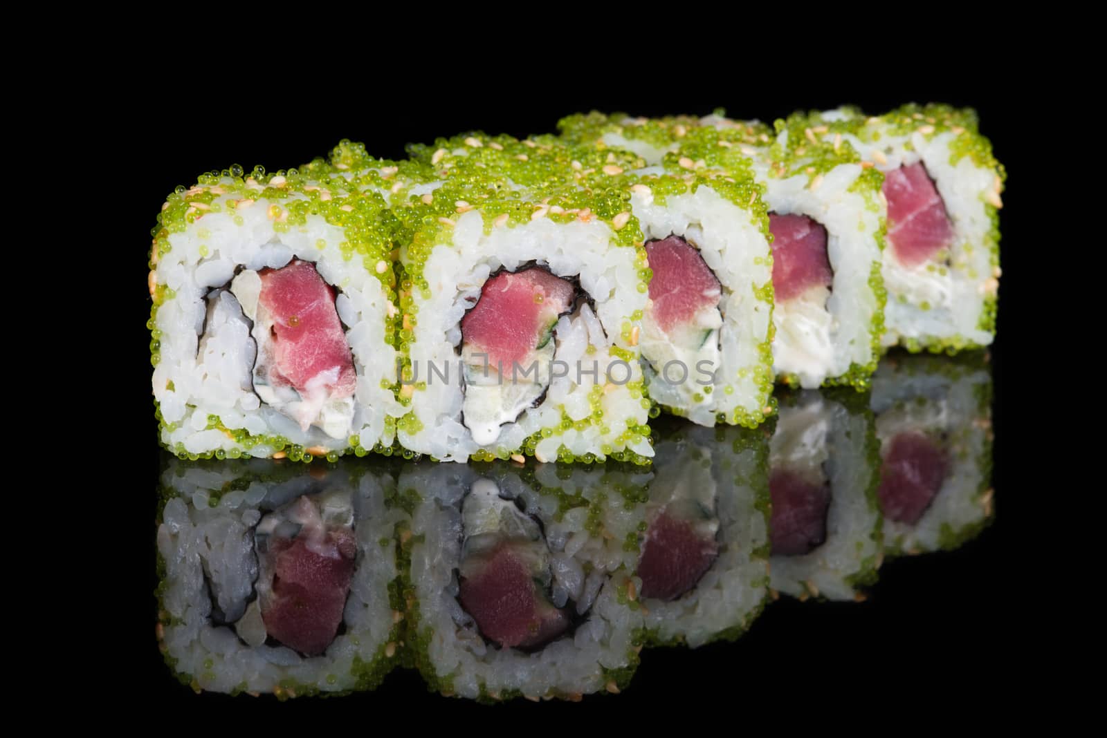 Sushi rolls with tuna, cucumber and flying fish roe by kzen