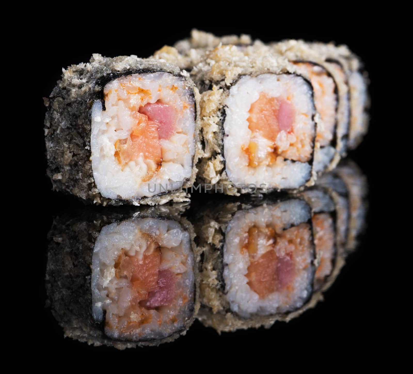 Grilled sushi rolls with salmon, tuna and eel by kzen