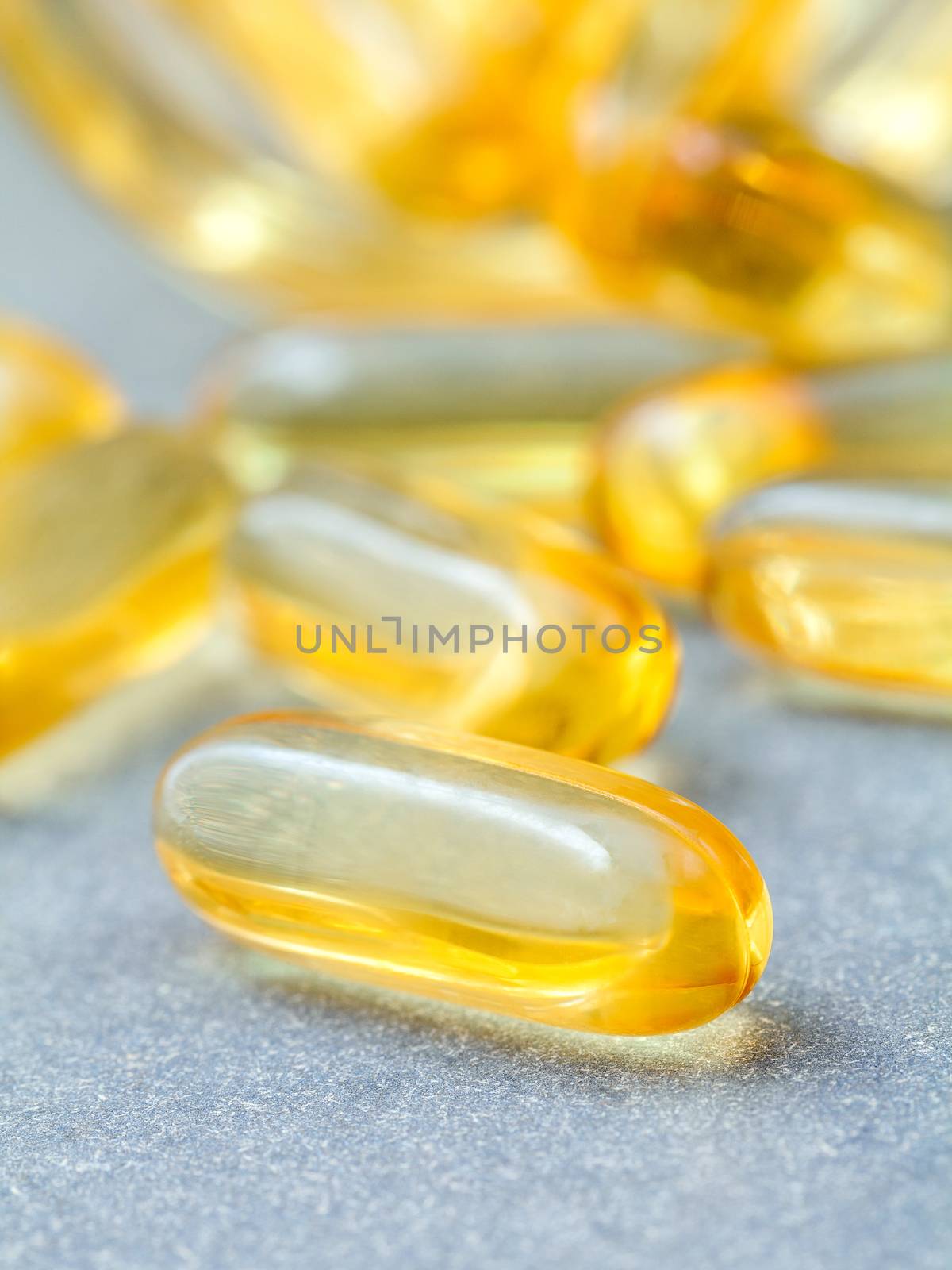 Close up capsules fish oil in Glass bottle .The supplement high  by kerdkanno