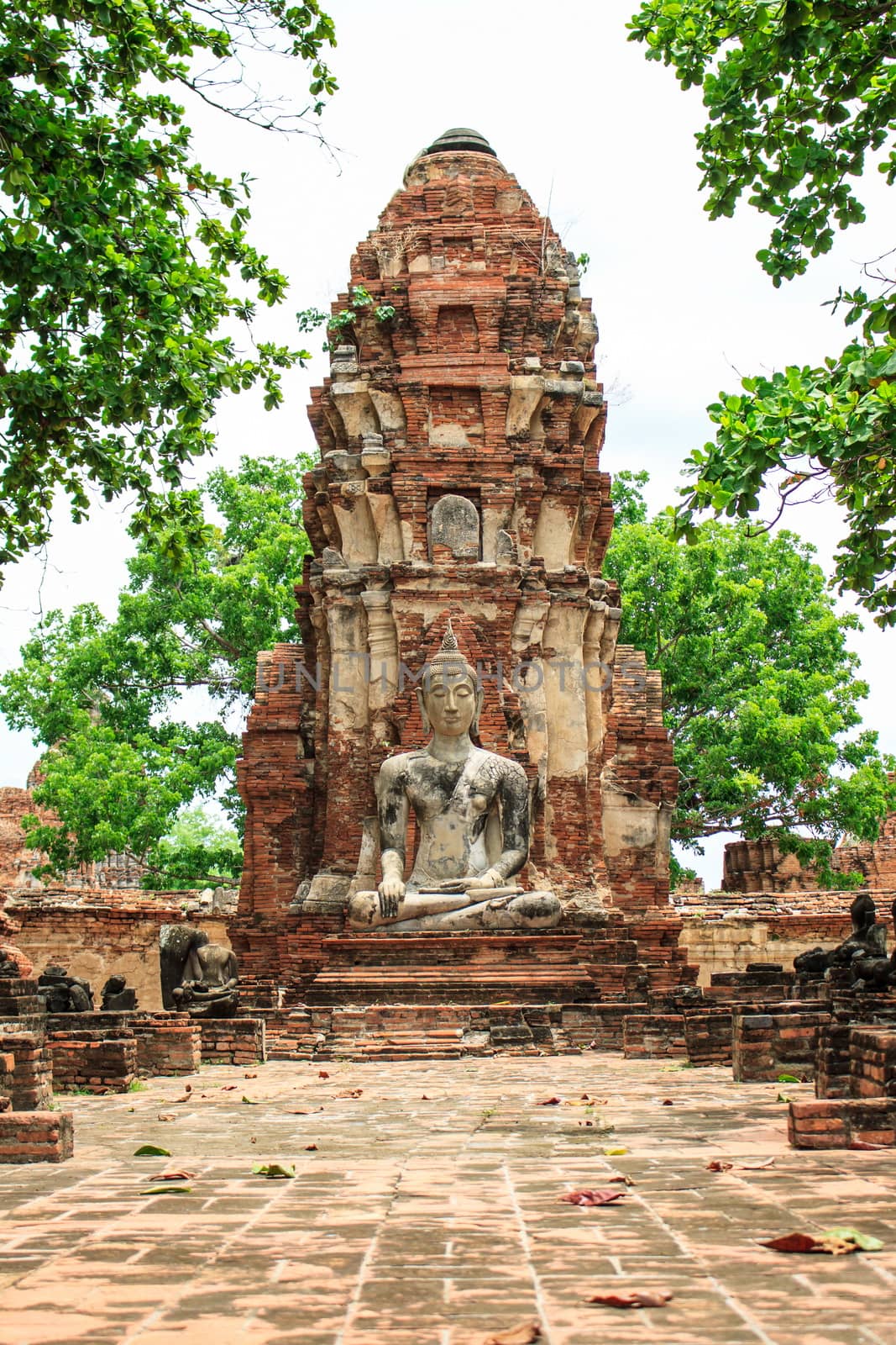 Old Buddha, Ayutthaya Thailand Southeast Asia Travel Concept by worrayuth