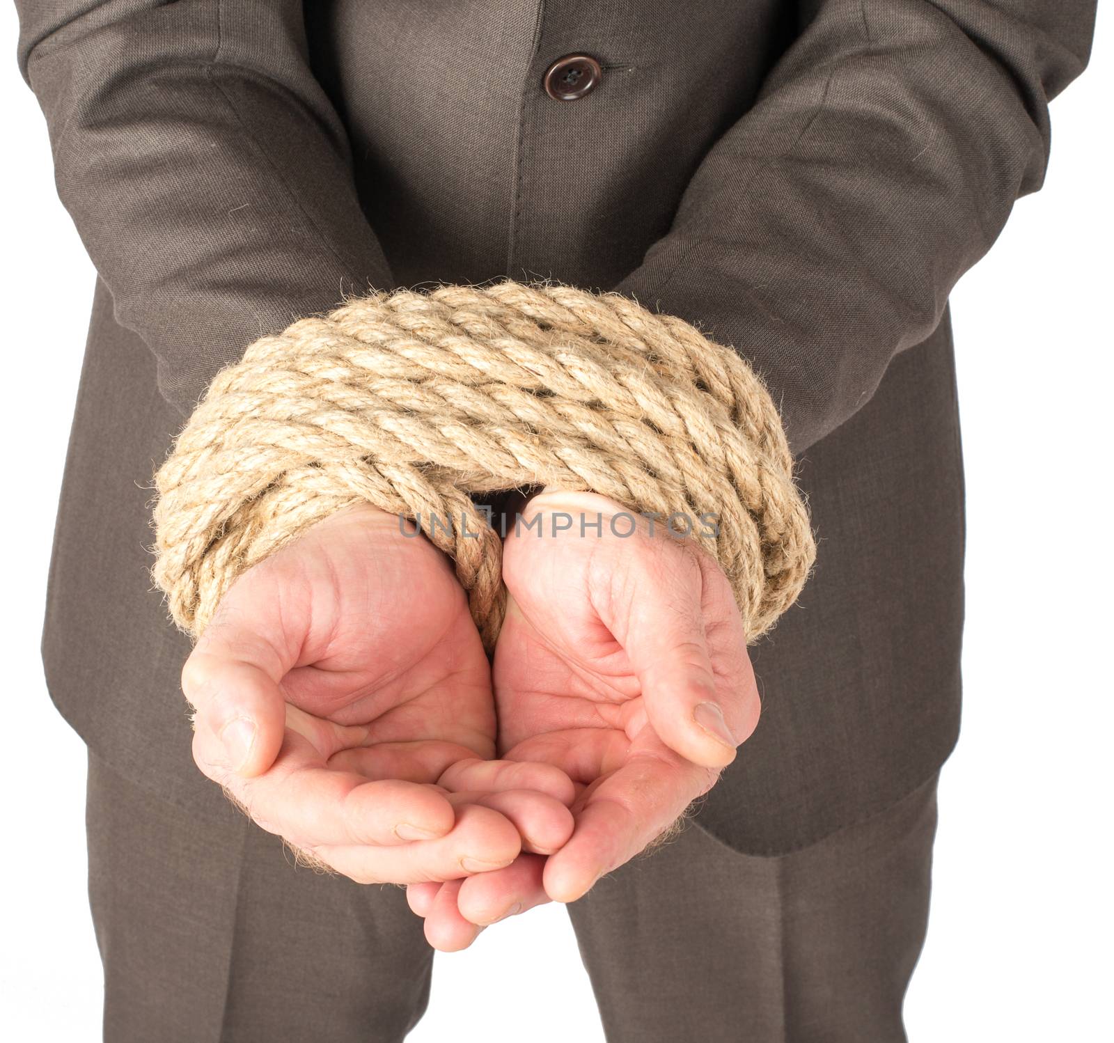 Businessman bound with rope isolated on white background