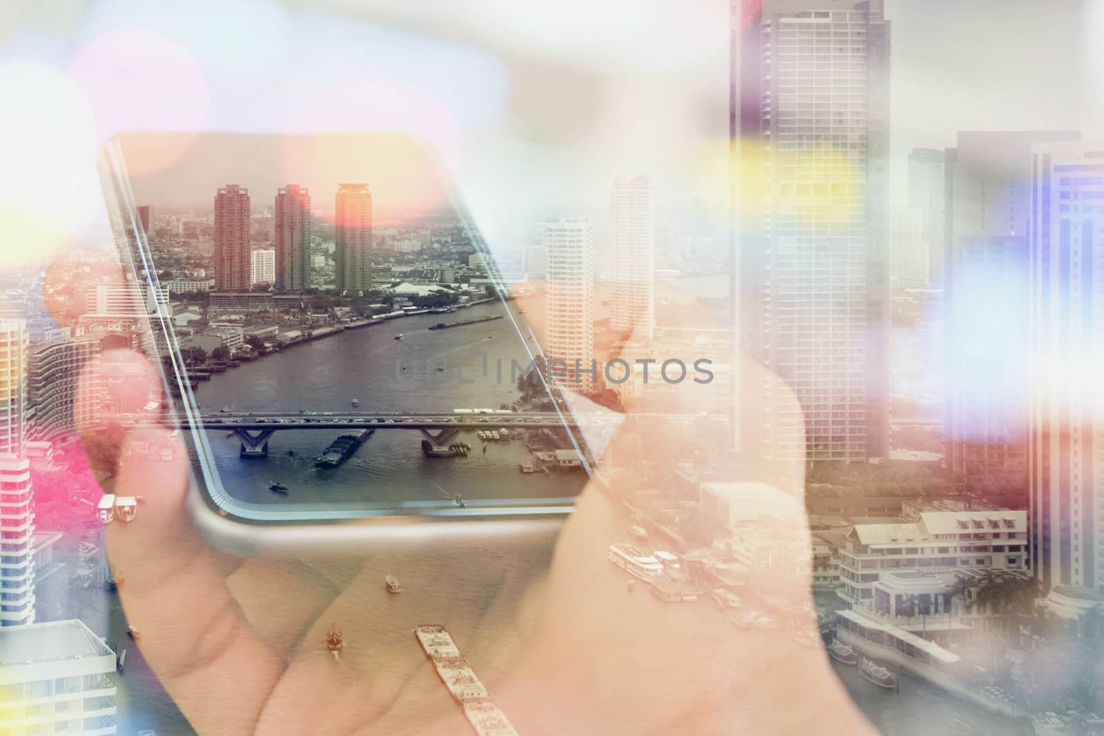 Double exposure image of businessman using smart phone with cityscape background, Business technology concept.