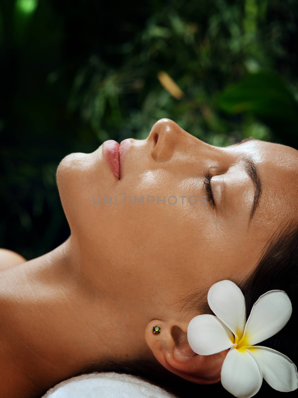 portrait of young beautiful woman on color back