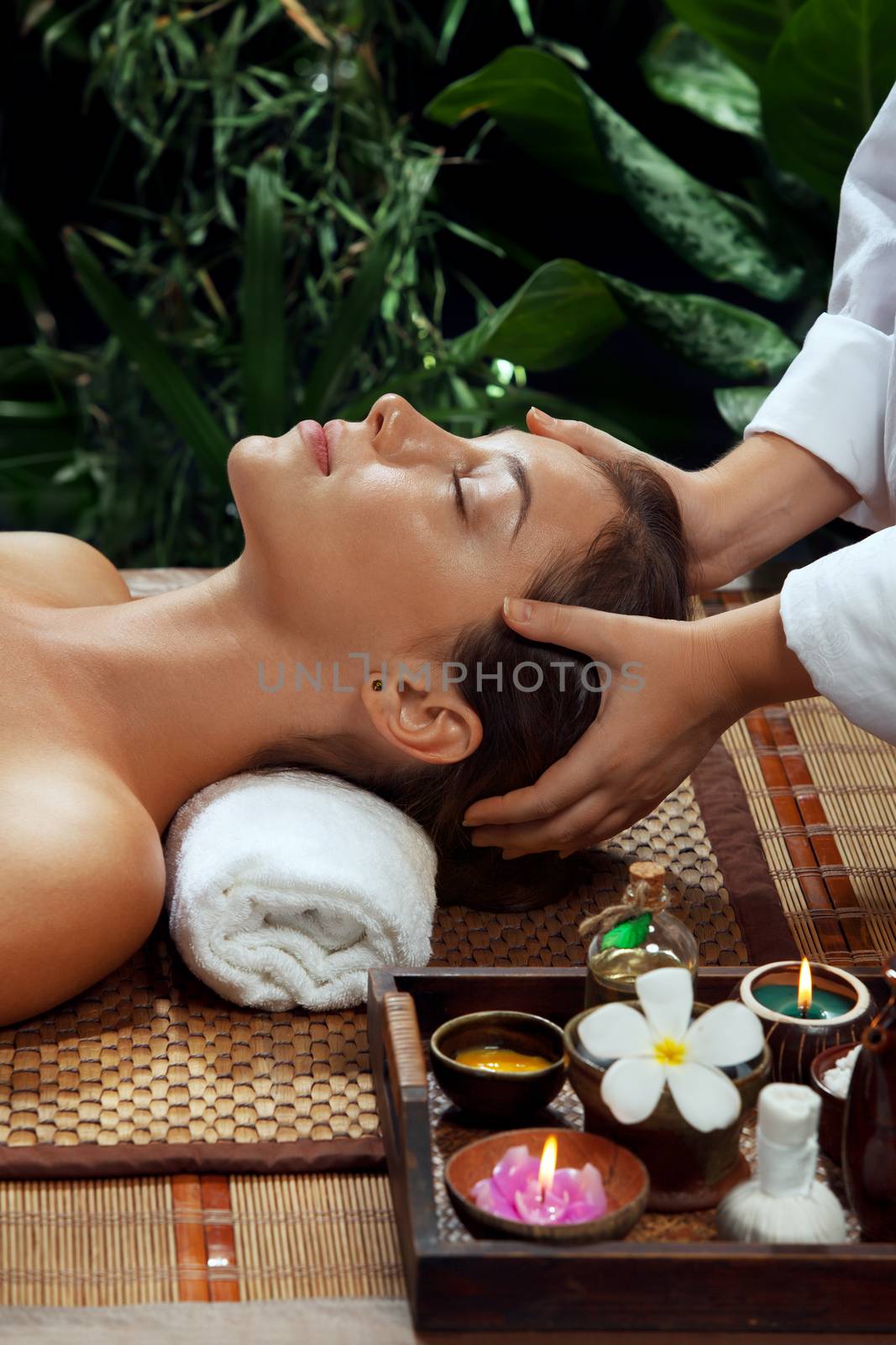 portrait of young beautiful woman in spa environment