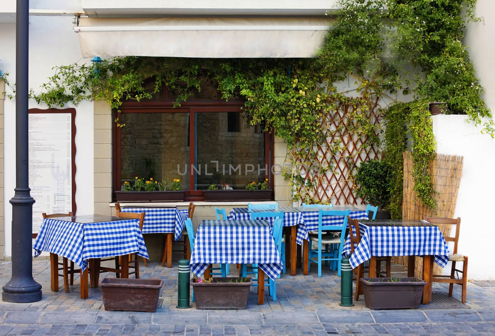 Larnaca, Cyprus - May 23, 2016: Small Street with cafe in Larnaca during Summer. Cuprus
