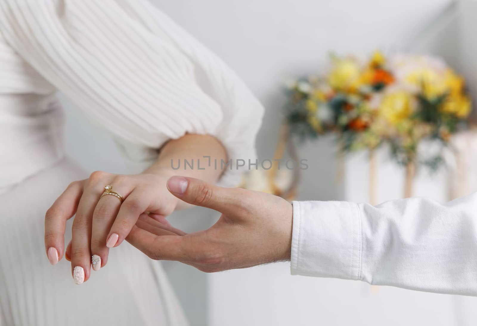 The groom keep the bride for hands
