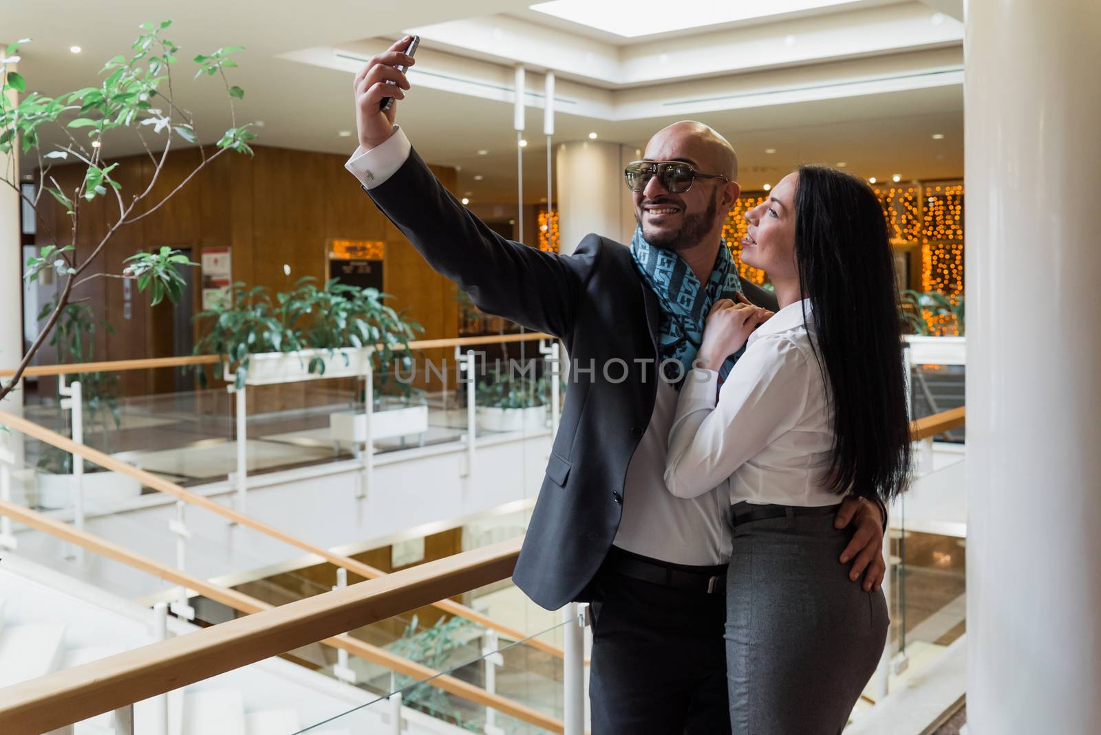 Arab businessman and girl making selfie by vipvn