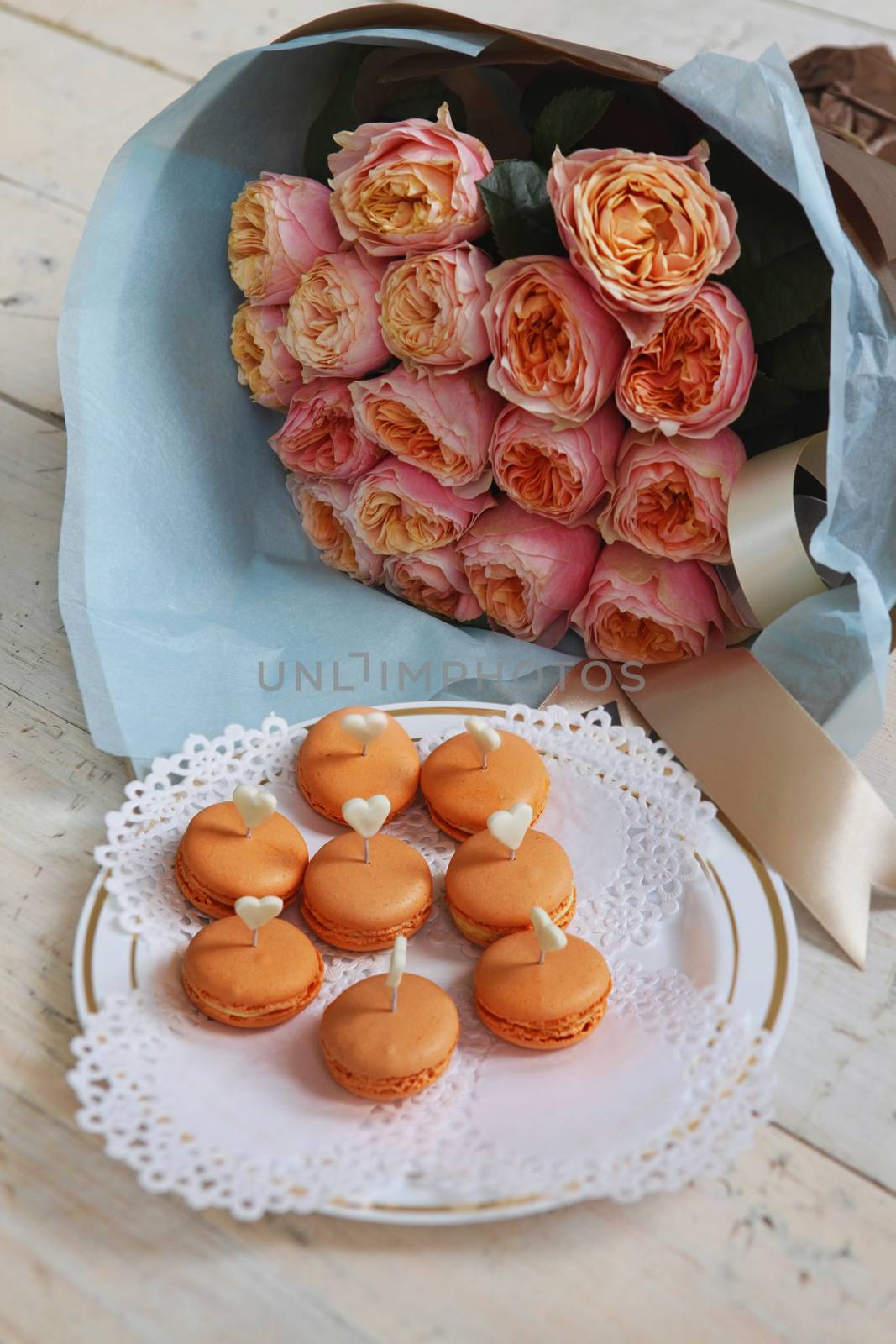 Beautiful cakes and bridal bouquet in orange tones