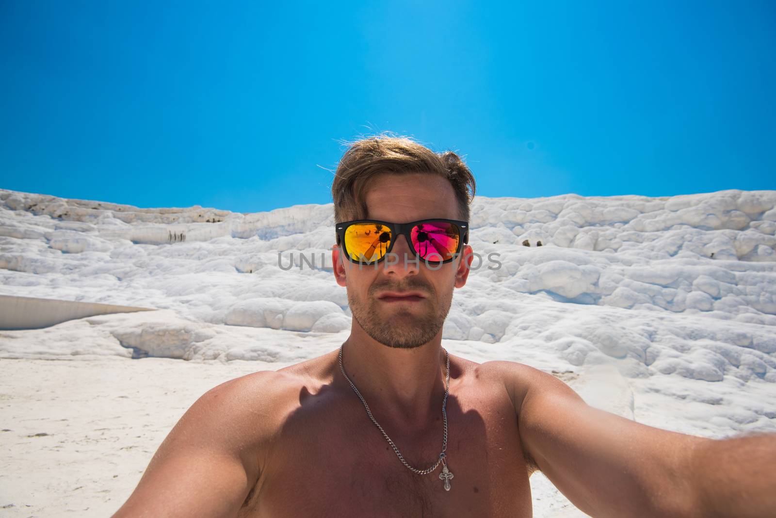 Selfie of man in Pammukale near modern Turkey city Denizli, Turkey