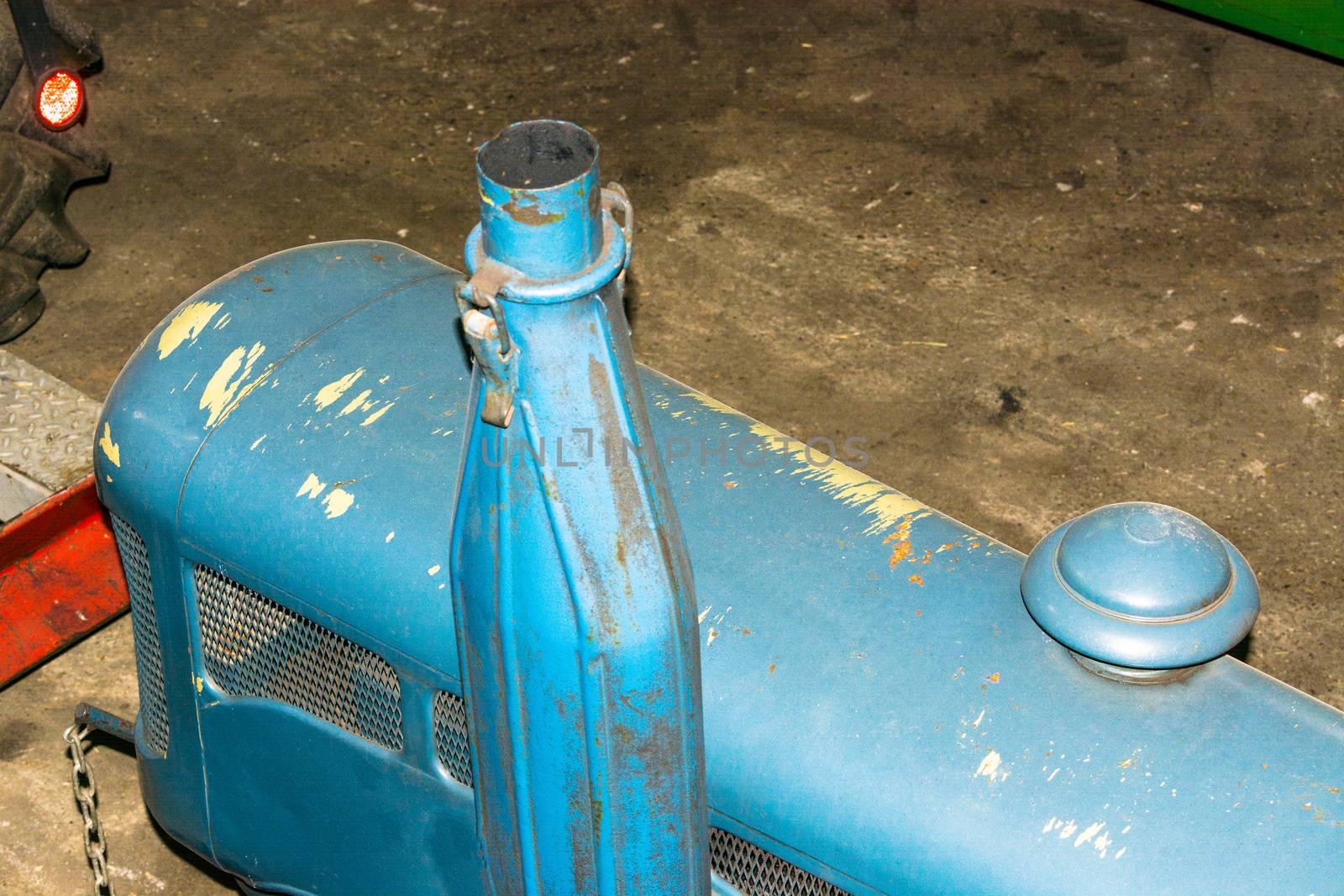 Detailed view of an old engine agricultural machine.