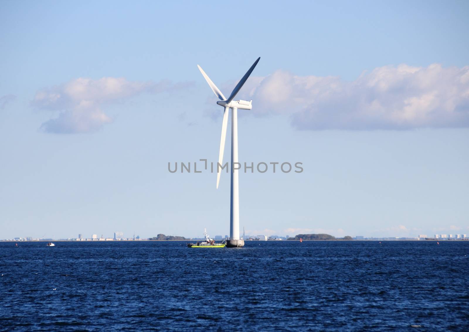Ocean windmill in rough sea with inspection ship by HoleInTheBox