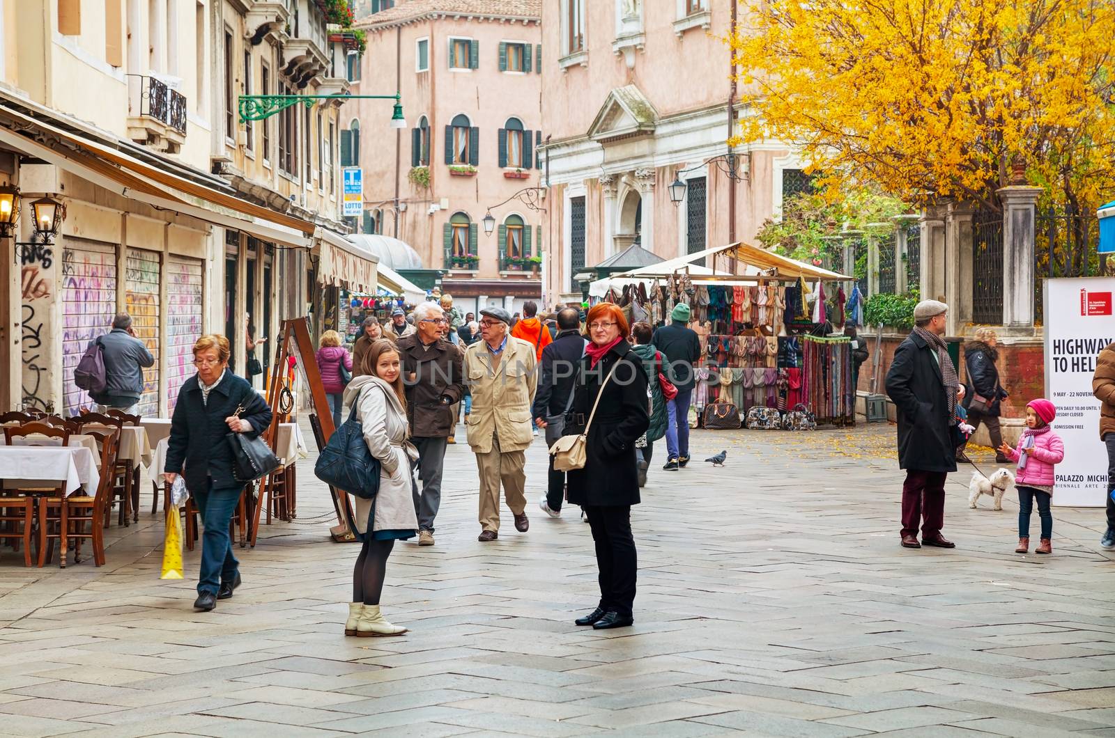 VENICE - NOVEMBER 20: Crowded with tourists Nuova street on November 20, 2015 in Venice, Italy. Venice is the capital of the Veneto region sited on a group of 118 small islands.